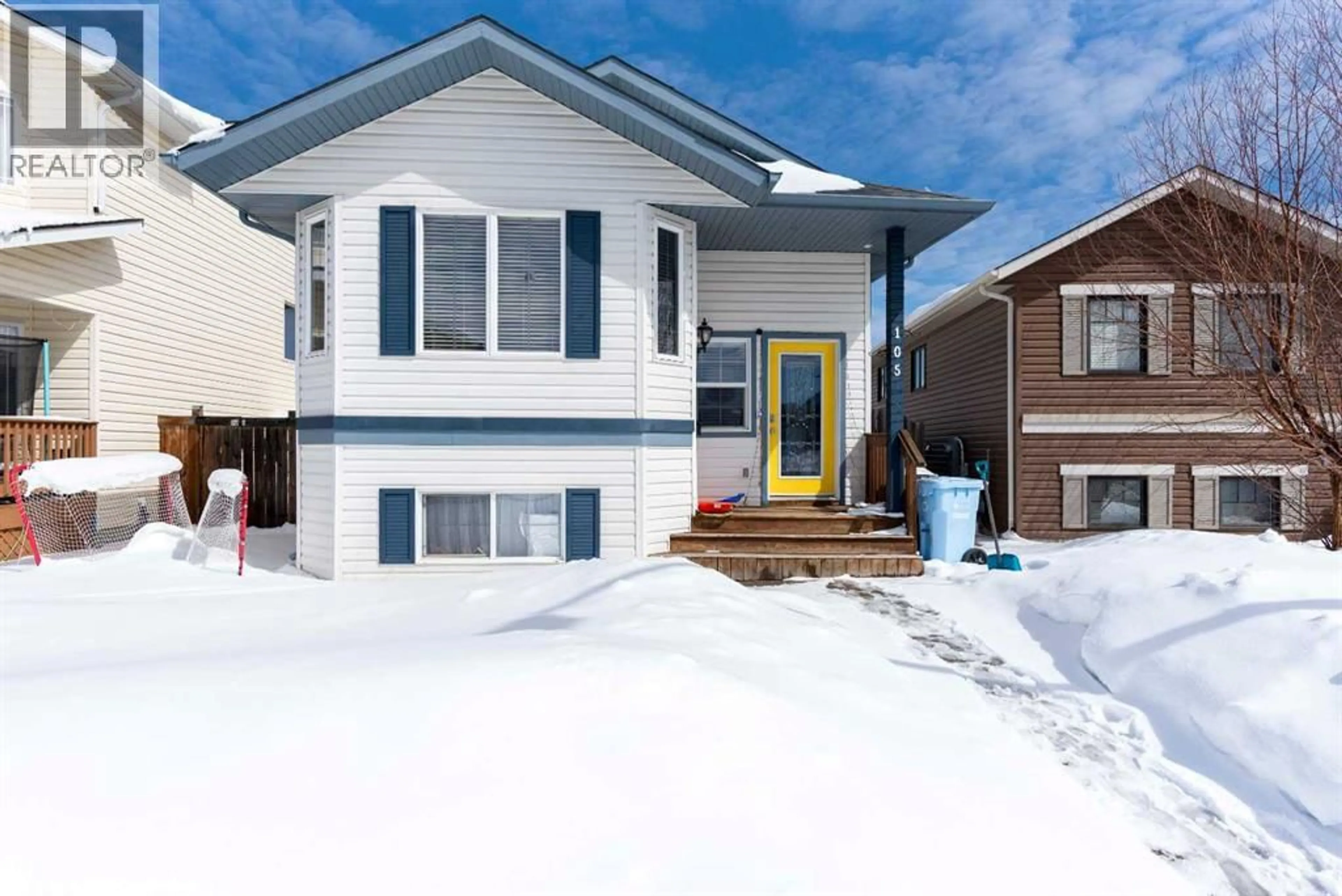 Home with vinyl exterior material, street for 105 ELDERBERRY STREET, Fort McMurray Alberta T9K0N6