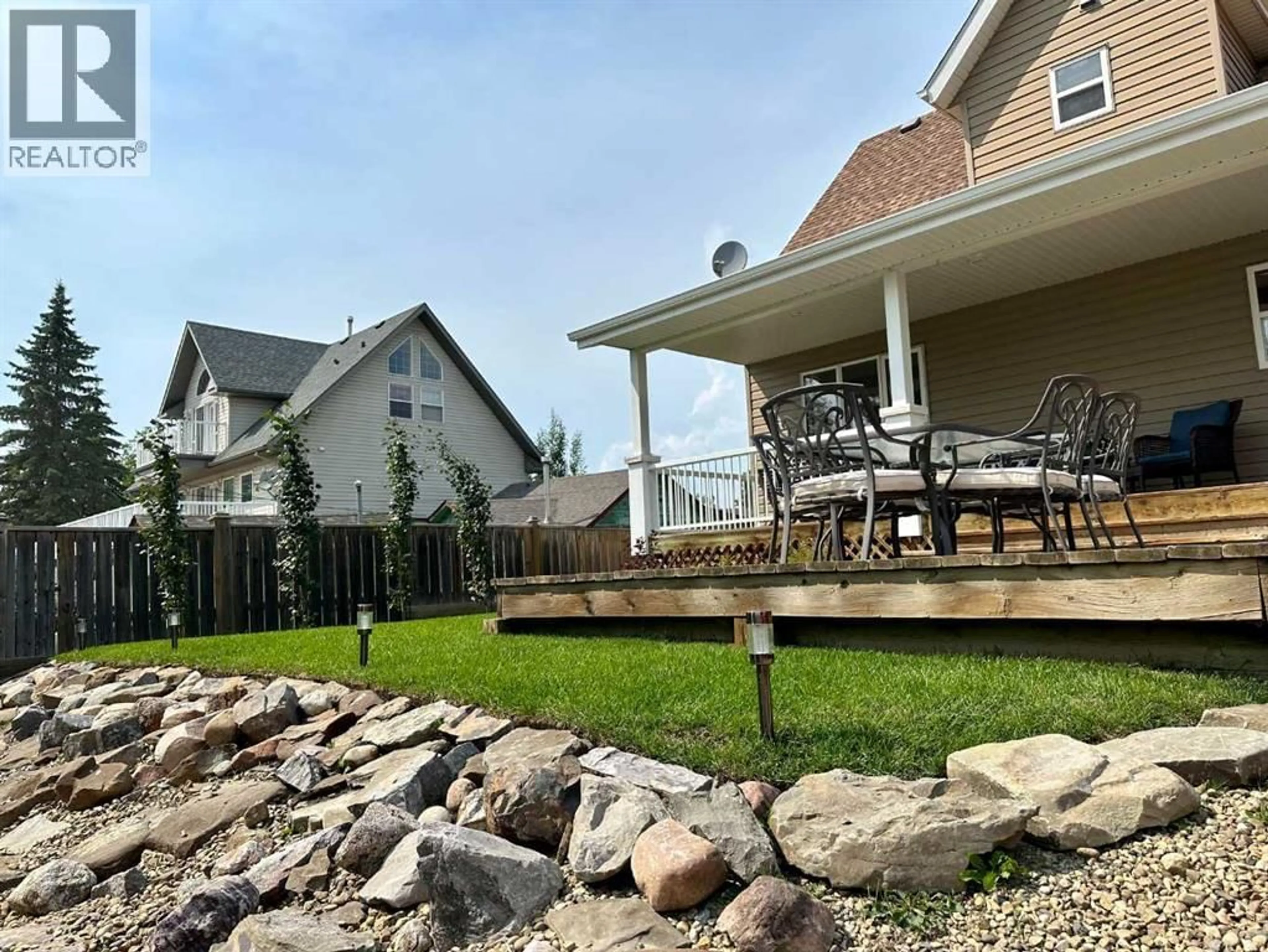 Patio, water/lake/river/ocean view for 5028 LAKESHORE DRIVE, Sylvan Lake Alberta T4S1A9