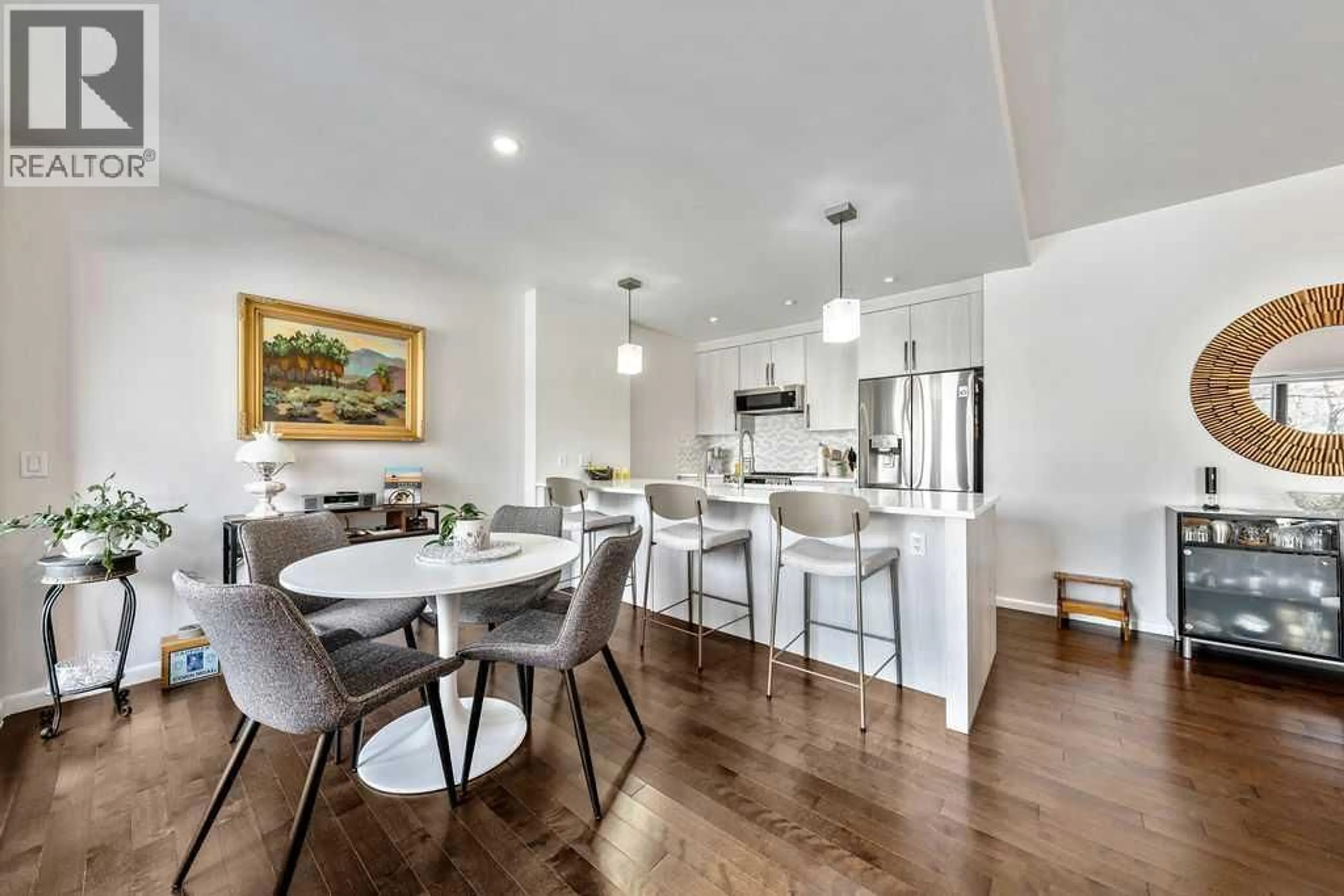 Open concept kitchen, wood/laminate floor for 414 MEREDITH ROAD NORTHEAST, Calgary Alberta T2E5A6