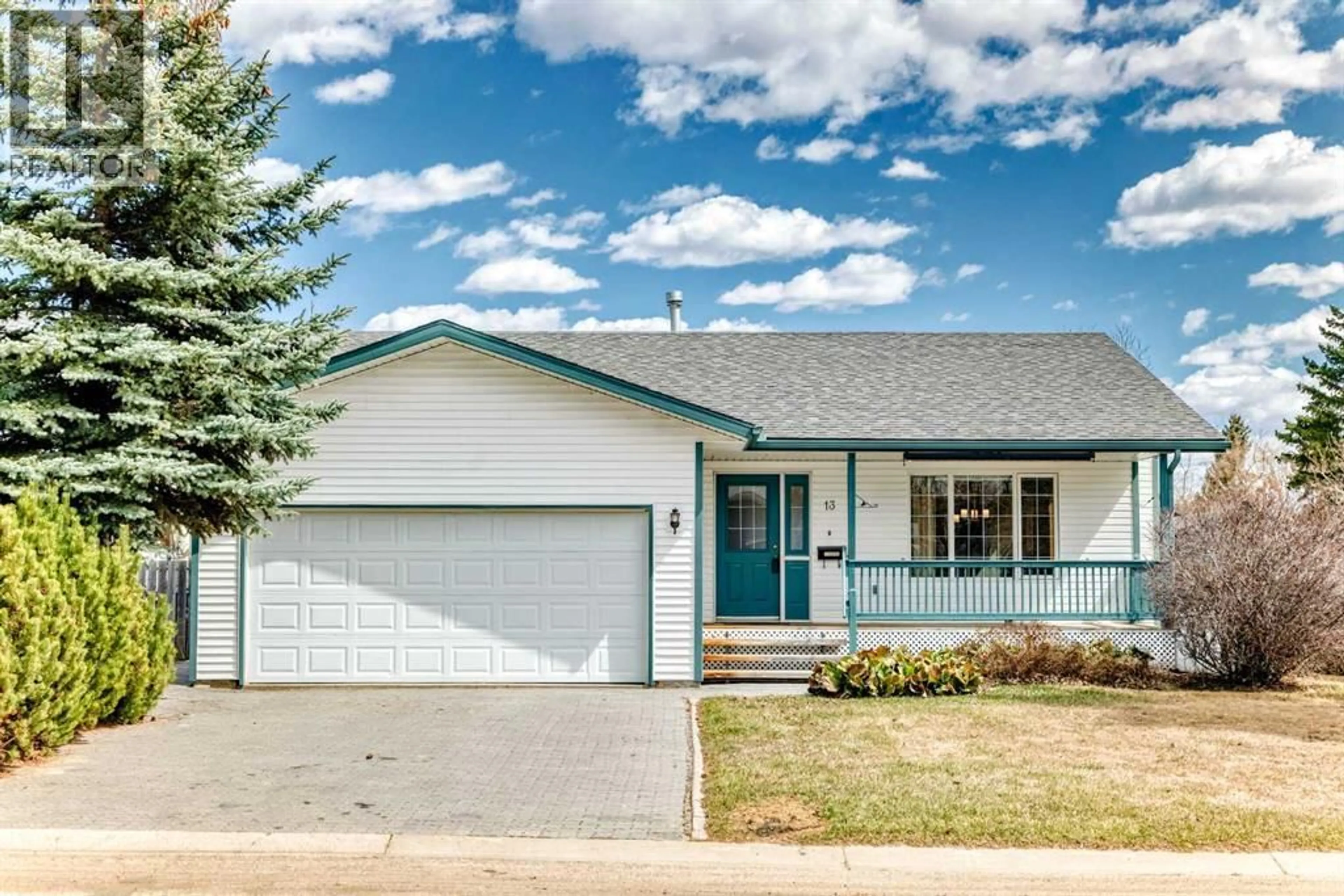 Home with vinyl exterior material, street for 13 GARDEN ROAD, Lacombe Alberta T4L1R5