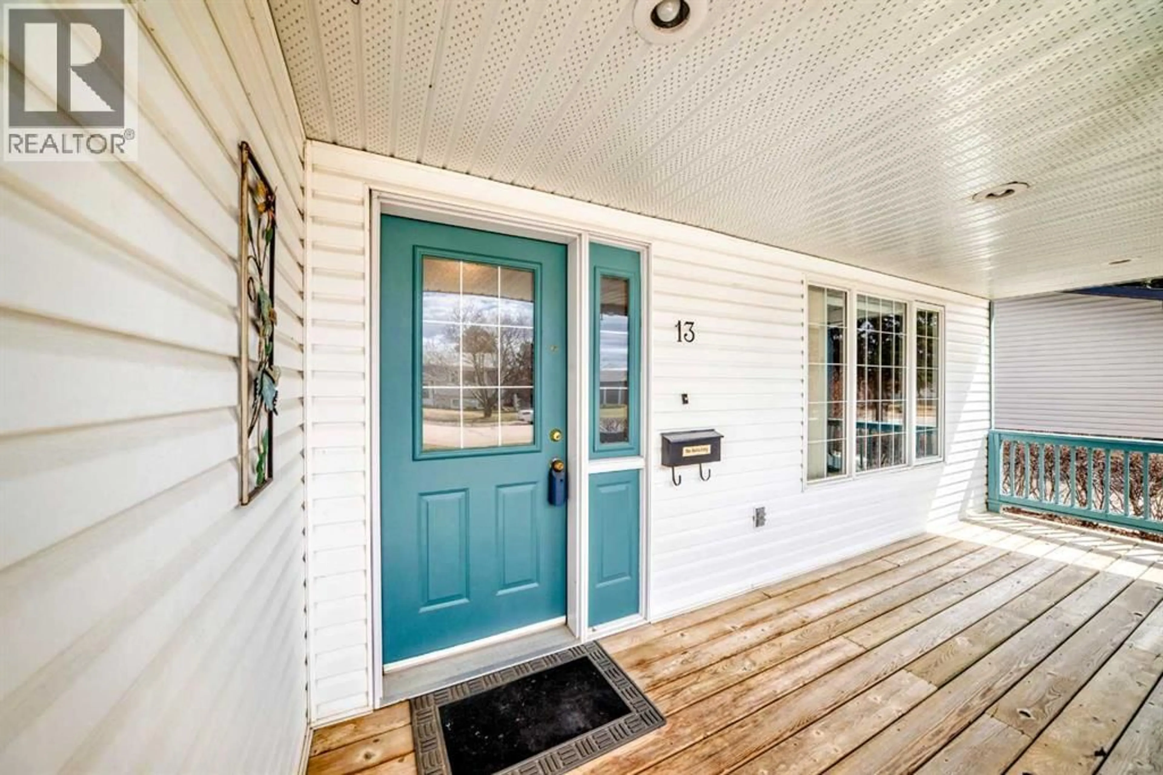 Indoor entryway for 13 GARDEN ROAD, Lacombe Alberta T4L1R5