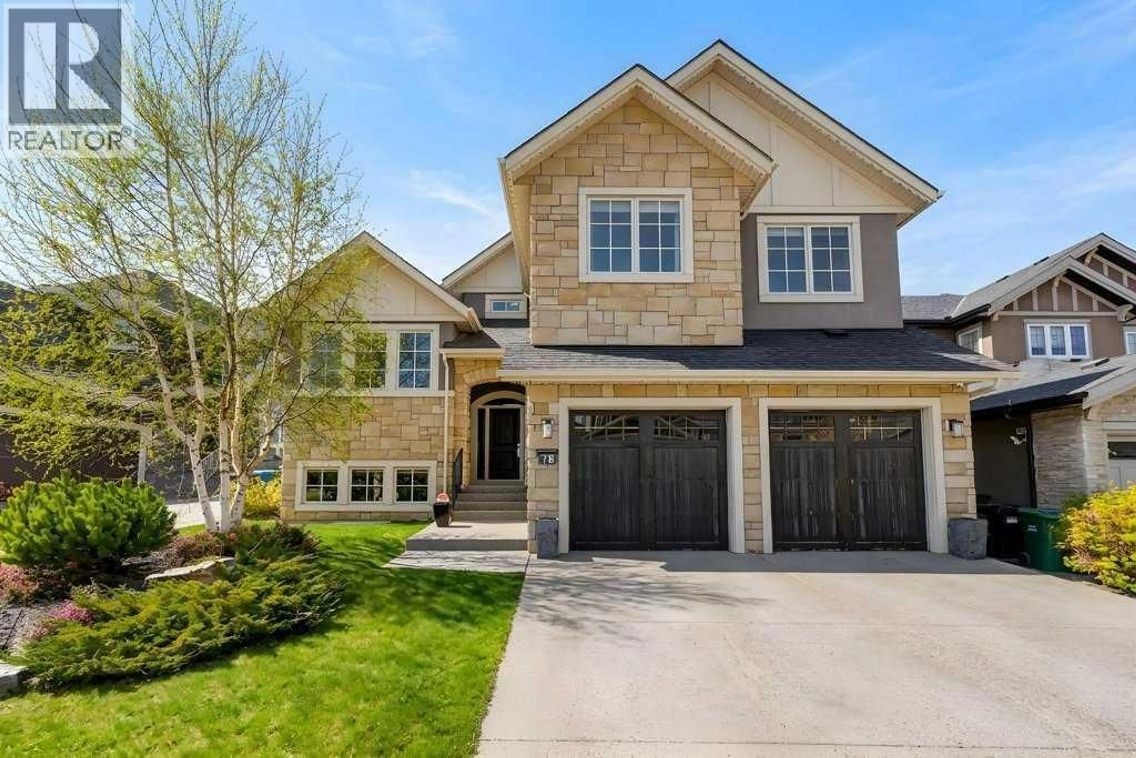 Home with brick exterior material, street for 78 ASPEN CLIFF CLOSE SOUTHWEST, Calgary Alberta T3H0L9