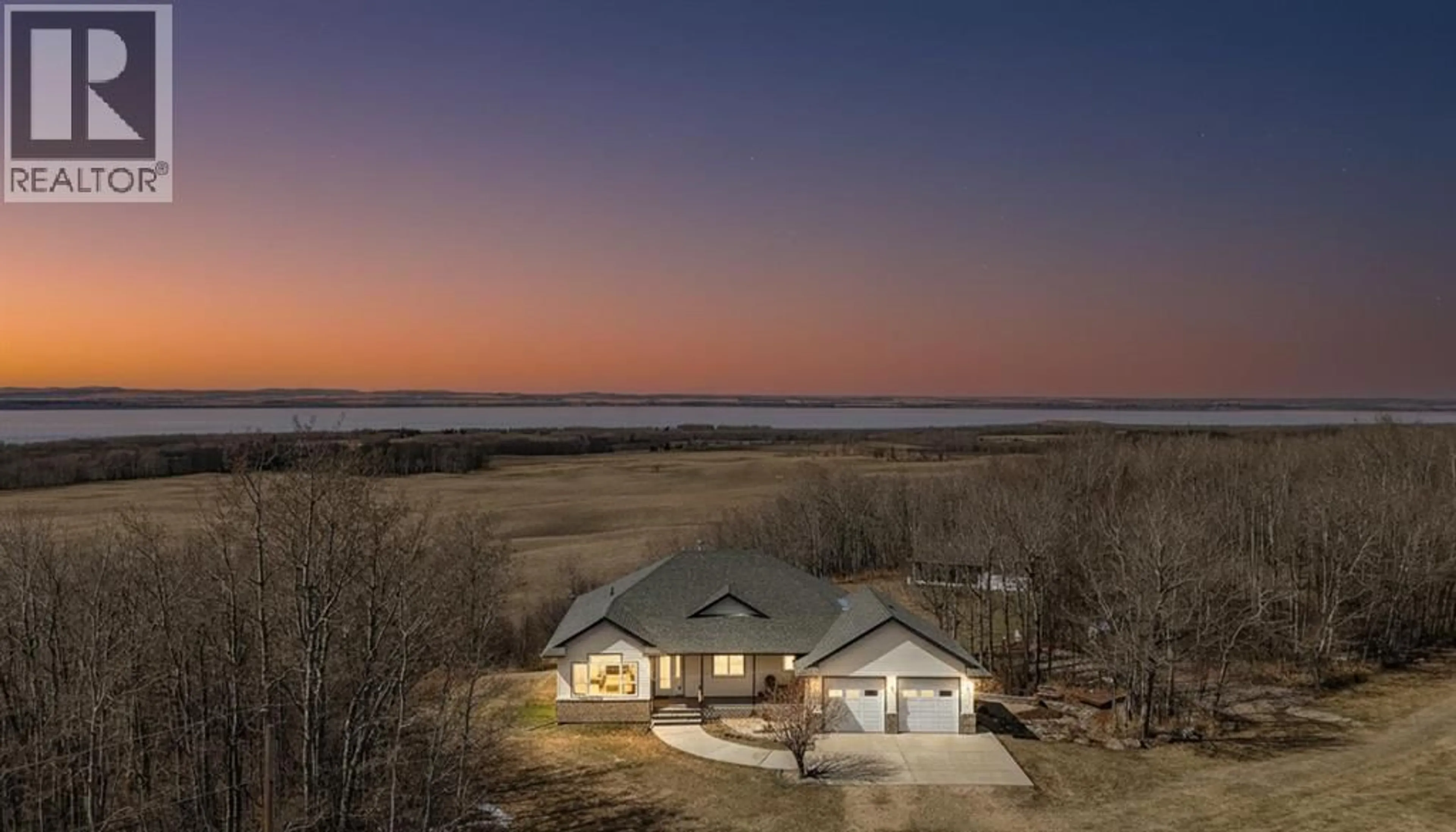 A pic from outside/outdoor area/front of a property/back of a property/a pic from drone, water/lake/river/ocean view for 415014 RANGE ROAD 282 RANGE, Rural Ponoka County Alberta T4L2N3