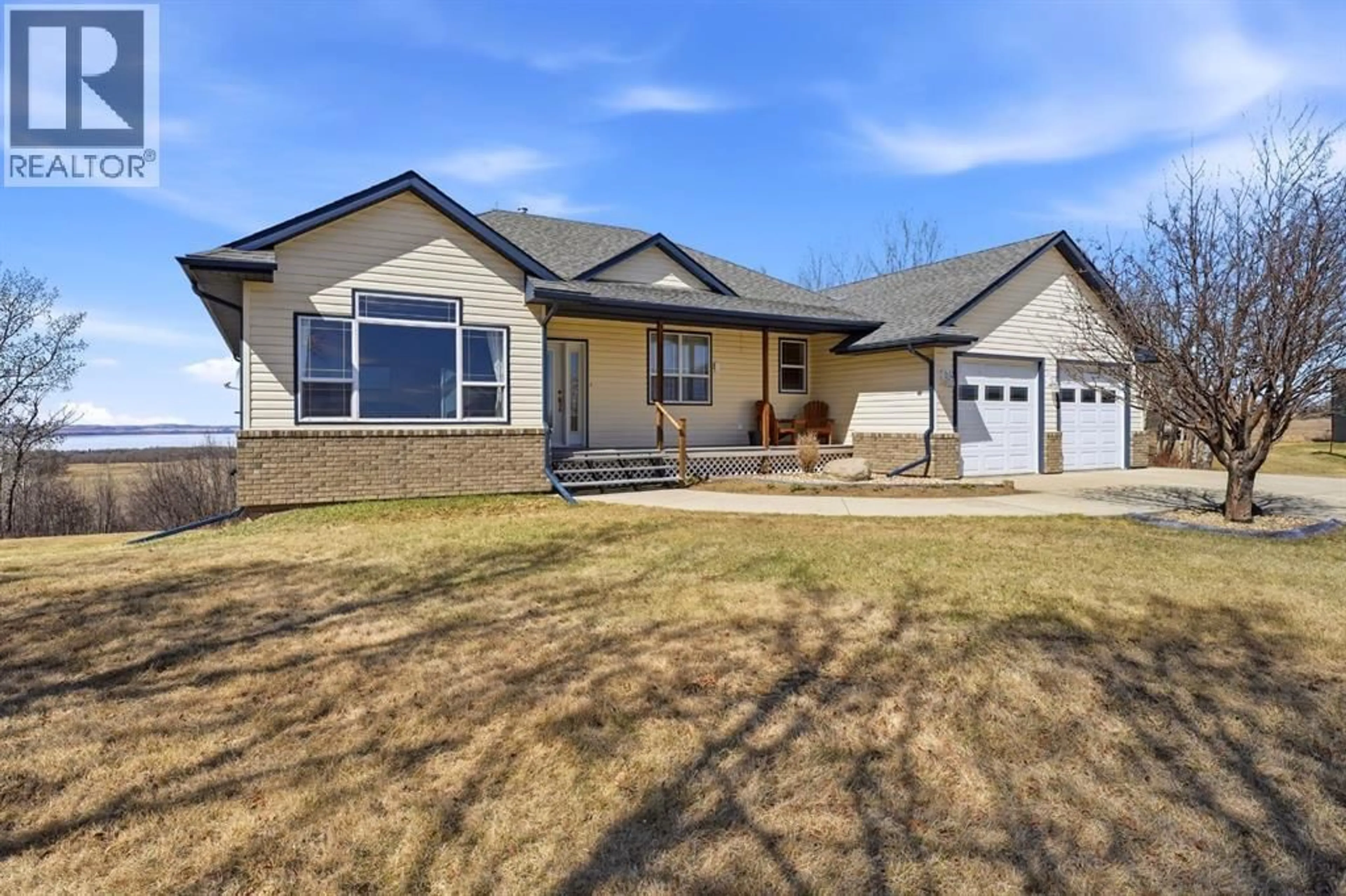 Home with brick exterior material, street for 415014 RANGE ROAD 282 RANGE, Rural Ponoka County Alberta T4L2N3