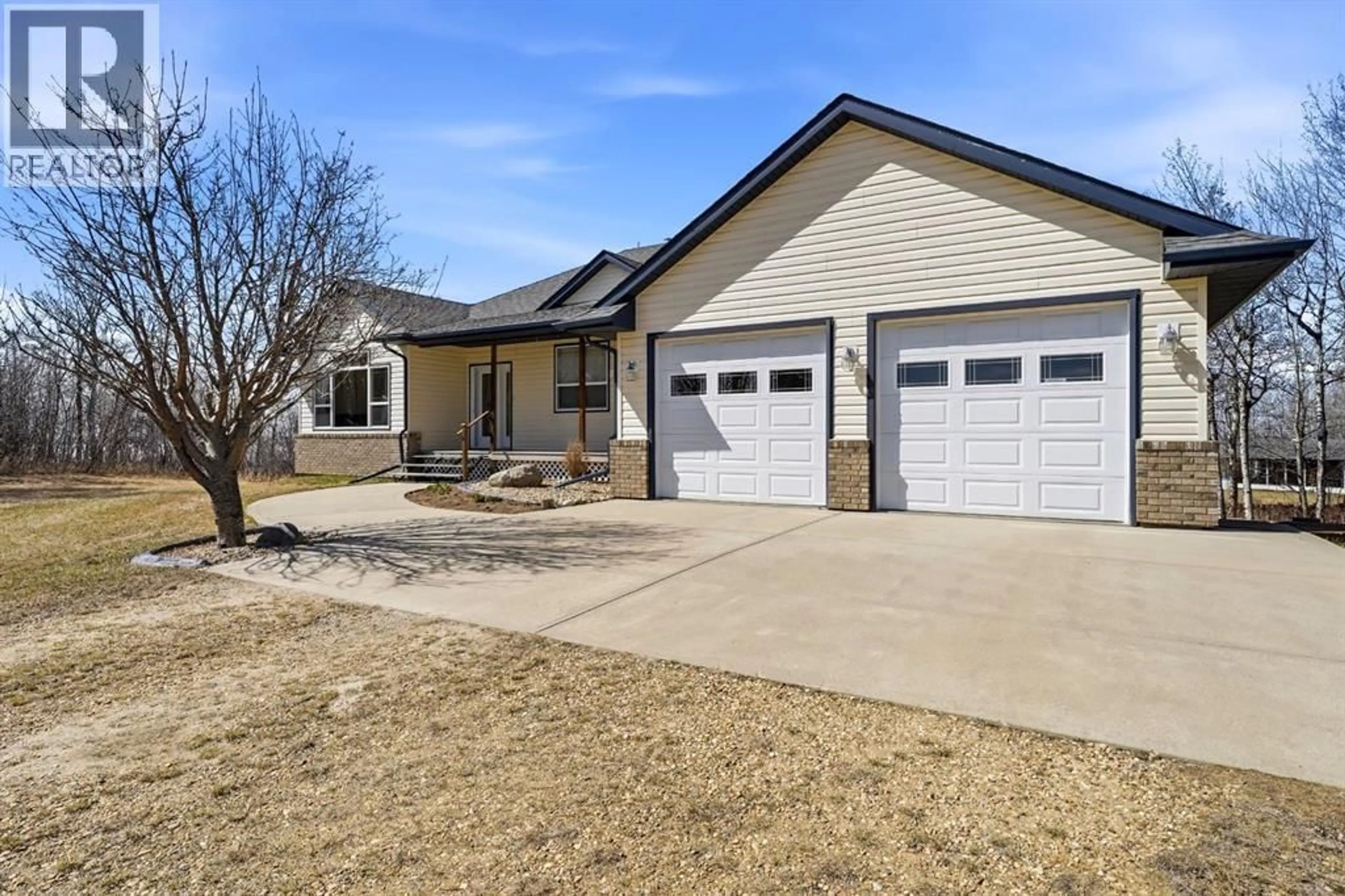 Home with vinyl exterior material, street for 415014 RANGE ROAD 282 RANGE, Rural Ponoka County Alberta T4L2N3