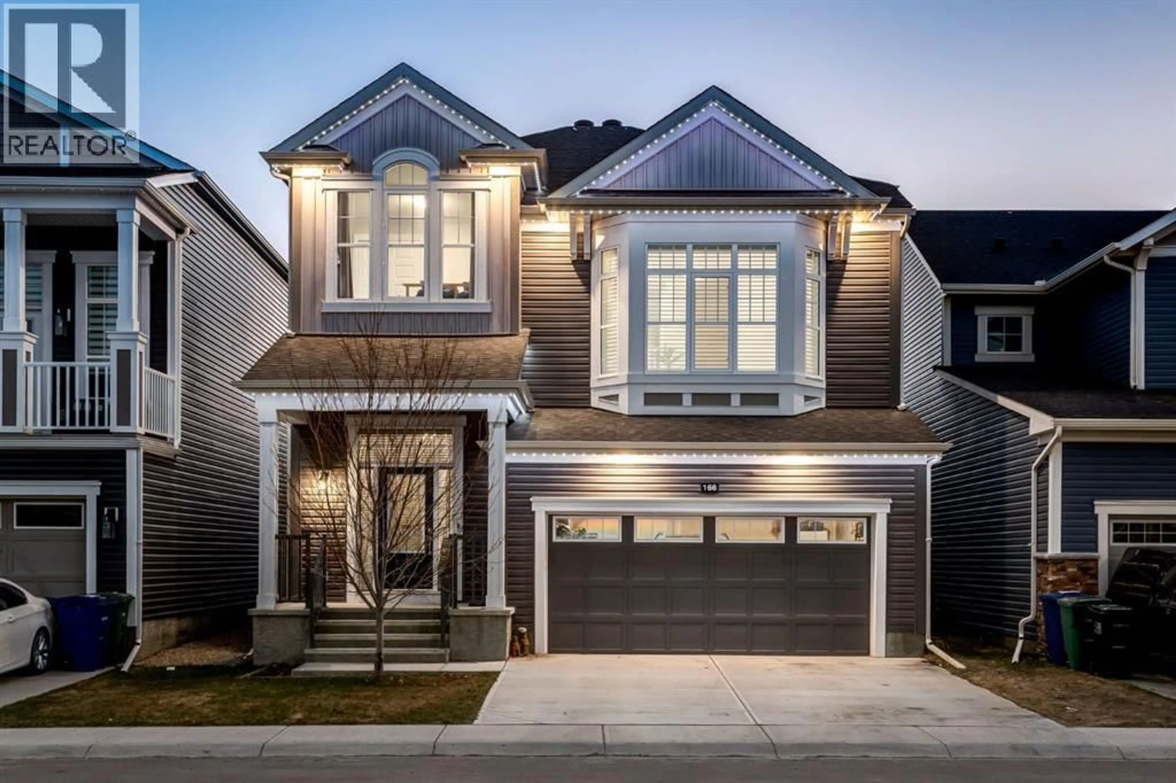 Home with brick exterior material, street for 166 OSBORNE COMMON SOUTHWEST, Airdrie Alberta T4B5G7