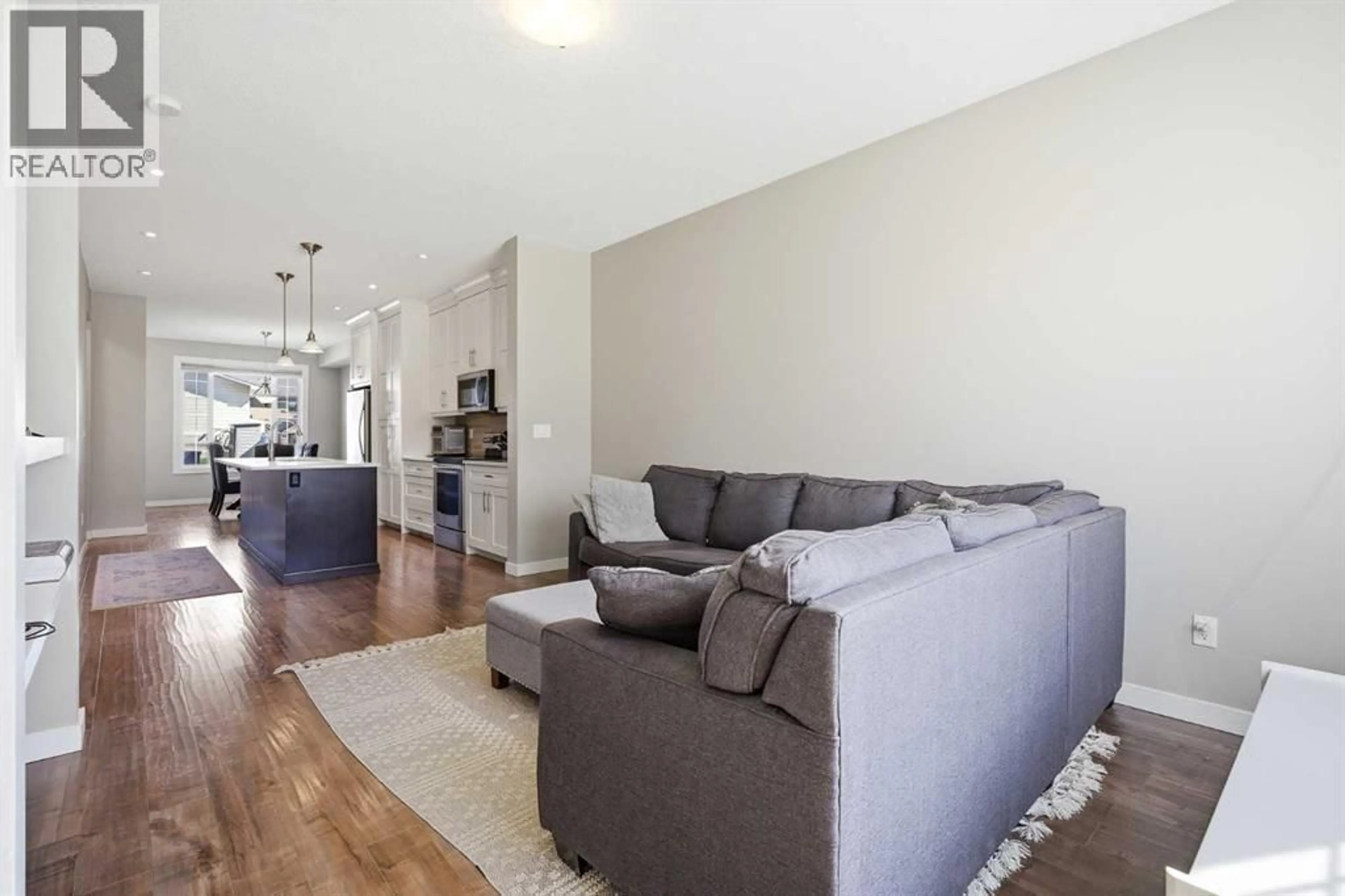 Living room with furniture, unknown for 1118 LIMIT AVENUE, Crossfield Alberta T0M0S0