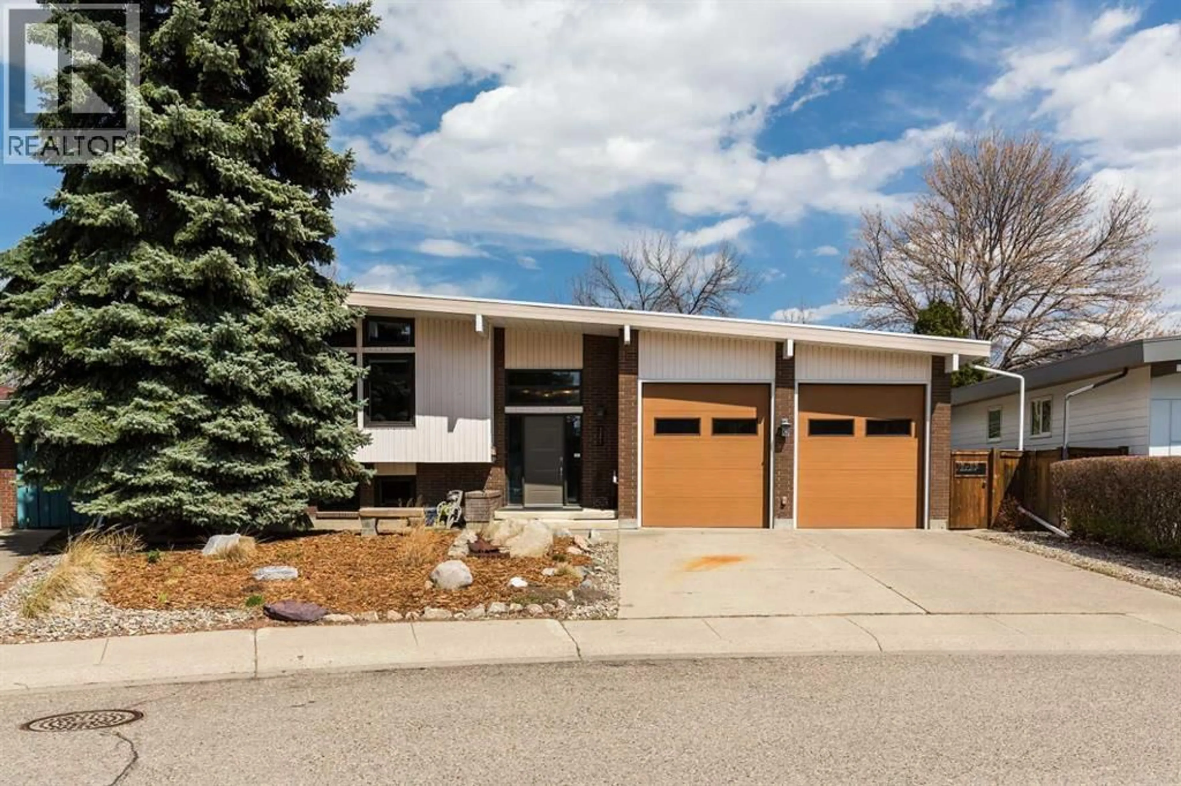 Home with brick exterior material, street for 321 NORMANDY ROAD SOUTH, Lethbridge Alberta T1J3X9