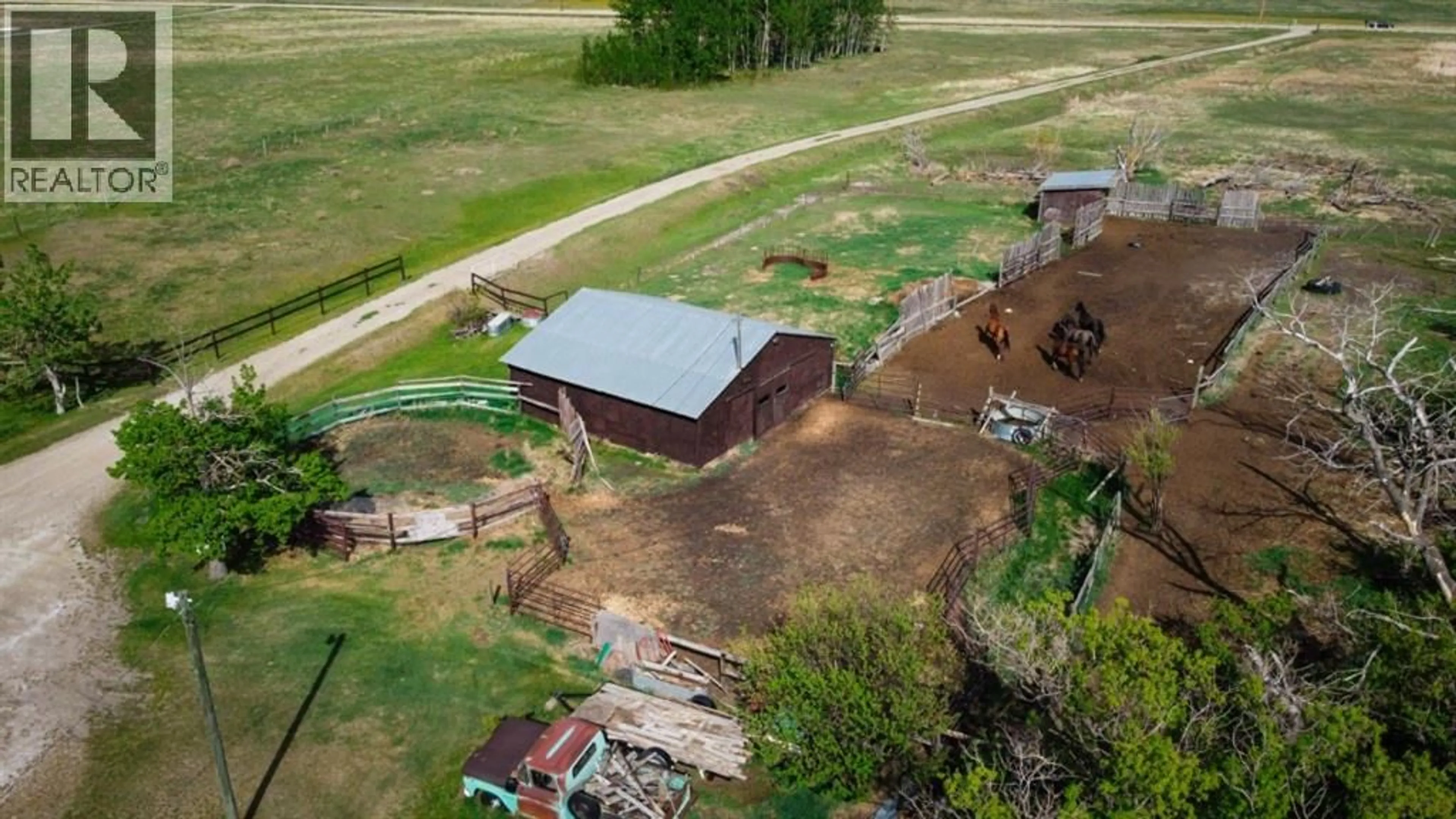 A pic from outside/outdoor area/front of a property/back of a property/a pic from drone, building for 240141 RANGE ROAD 274, Rural Rocky View County Alberta T1X2H9