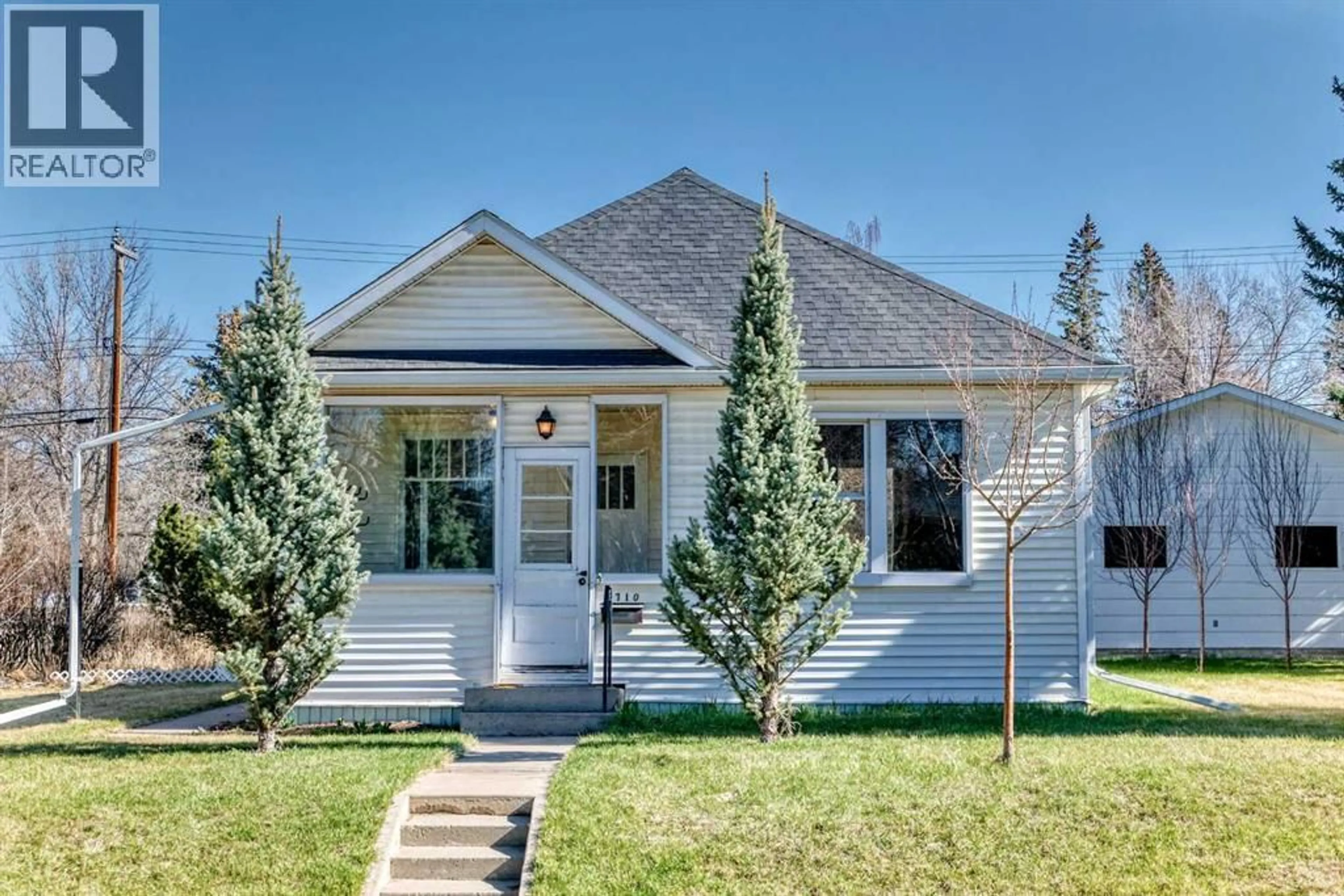 Home with vinyl exterior material, street for 4710 51 STREET, Olds Alberta T4H1E7