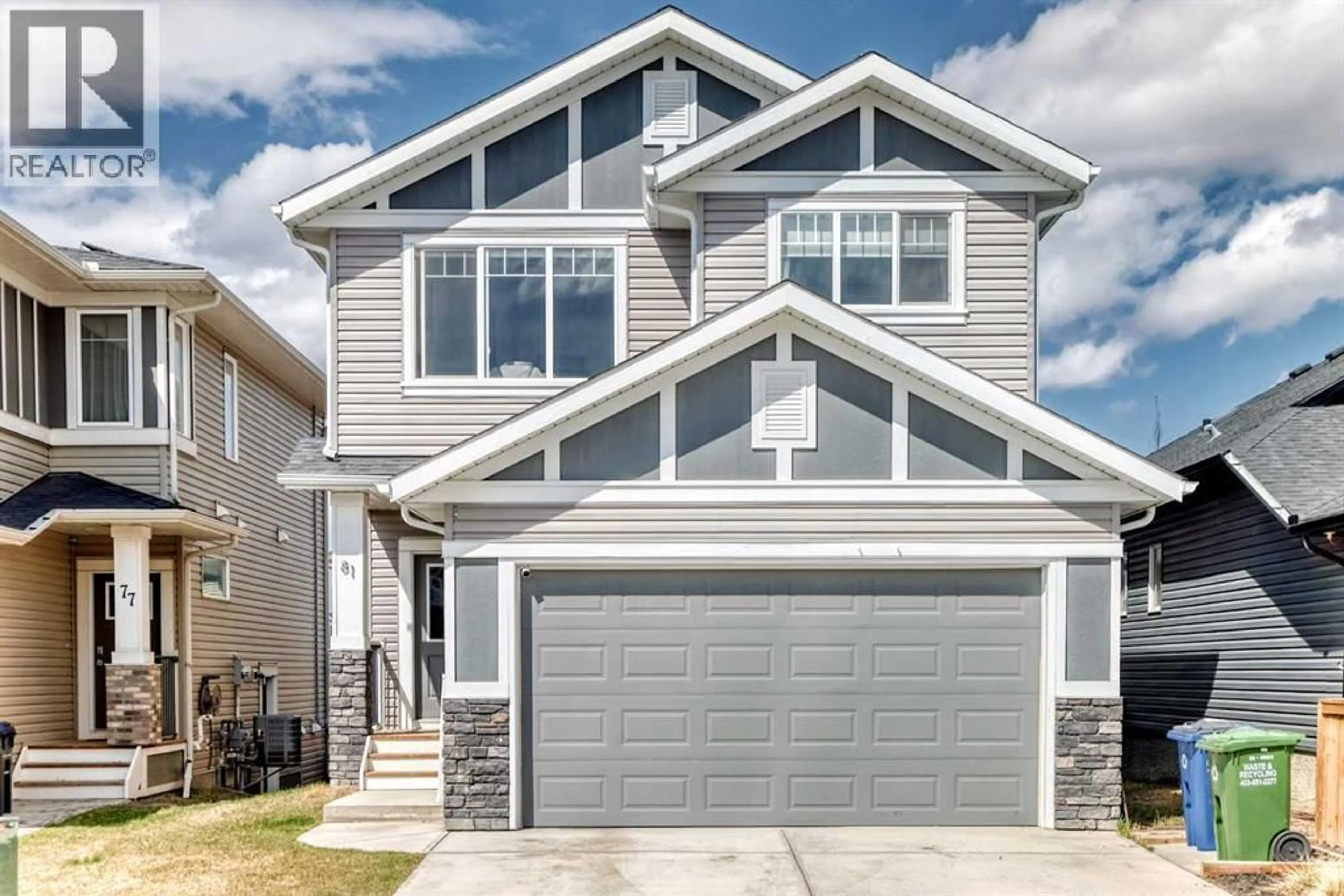 Home with vinyl exterior material, street for 81 WILLOW COURT, Cochrane Alberta T4C2S7