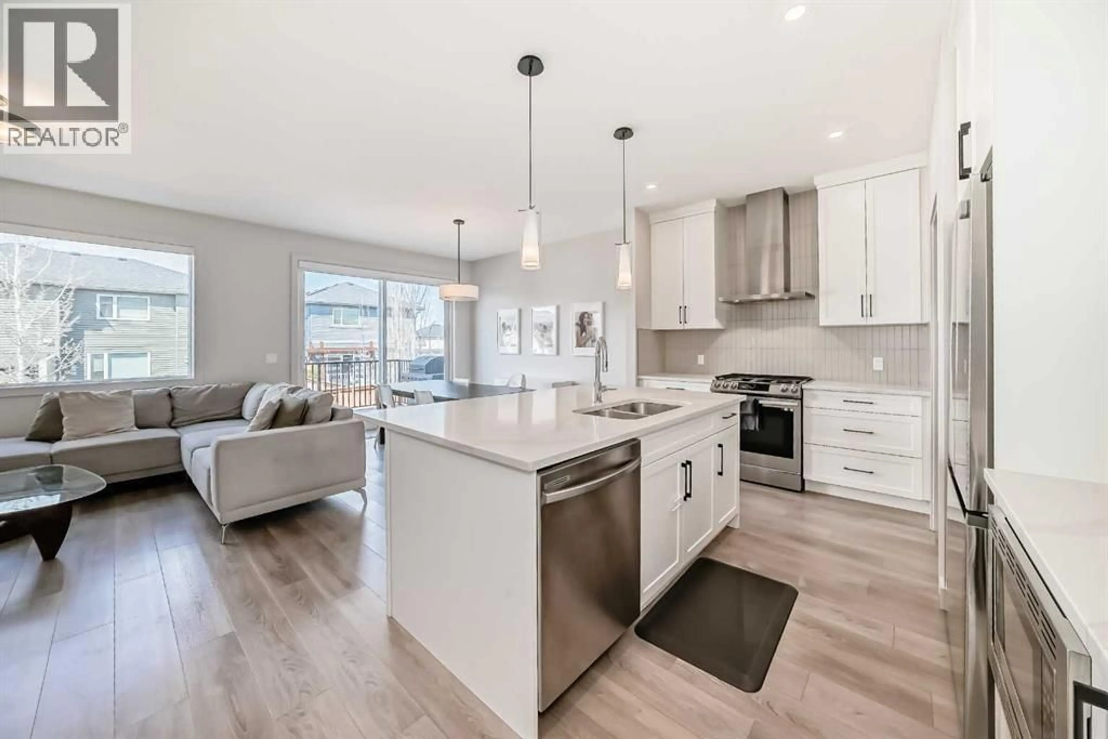 Open concept kitchen, unknown for 81 WILLOW COURT, Cochrane Alberta T4C2S7