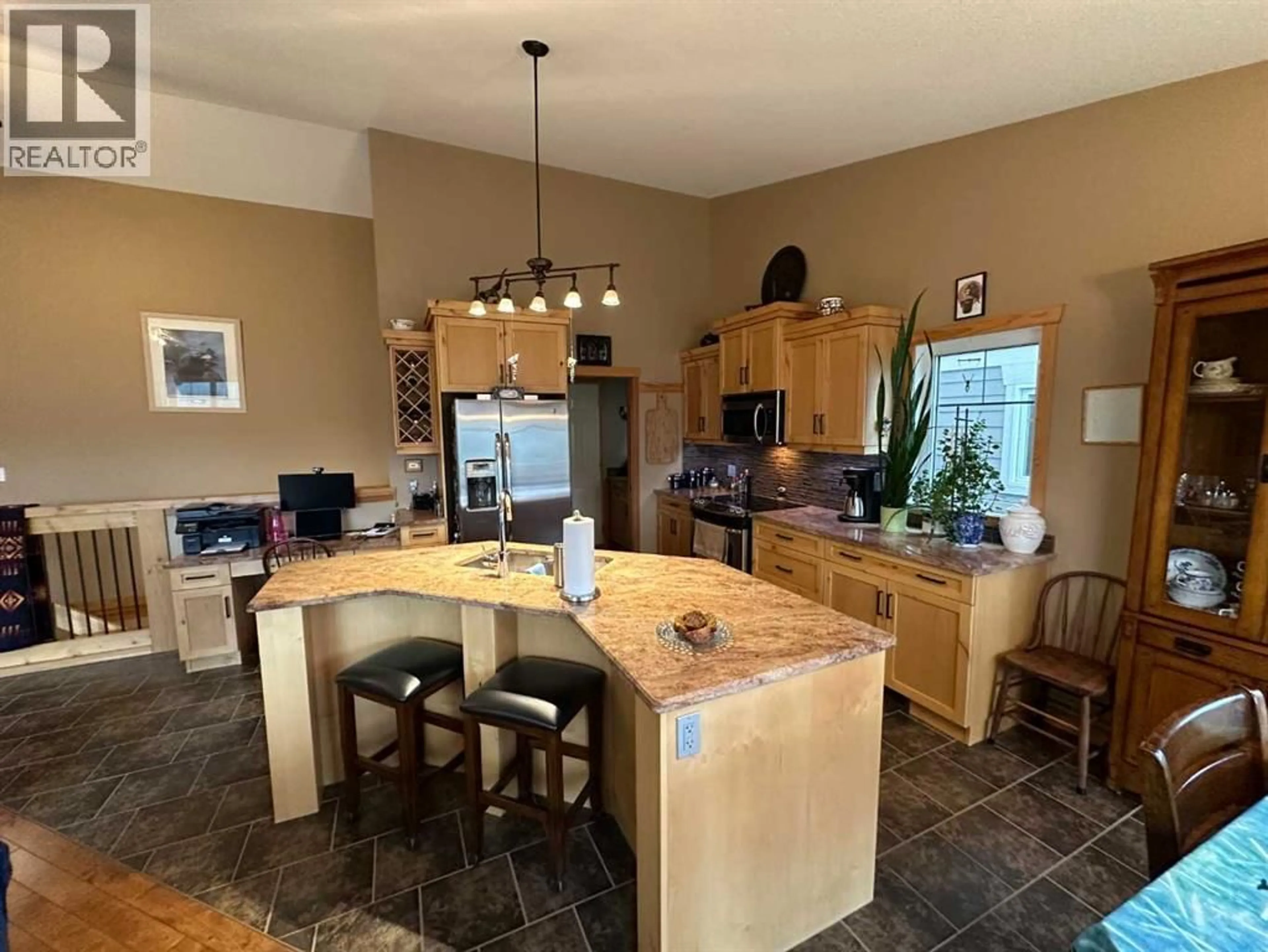 Open concept kitchen, ceramic/tile floor for 21 IRONSTONE DRIVE, Coleman Alberta T0K0M0