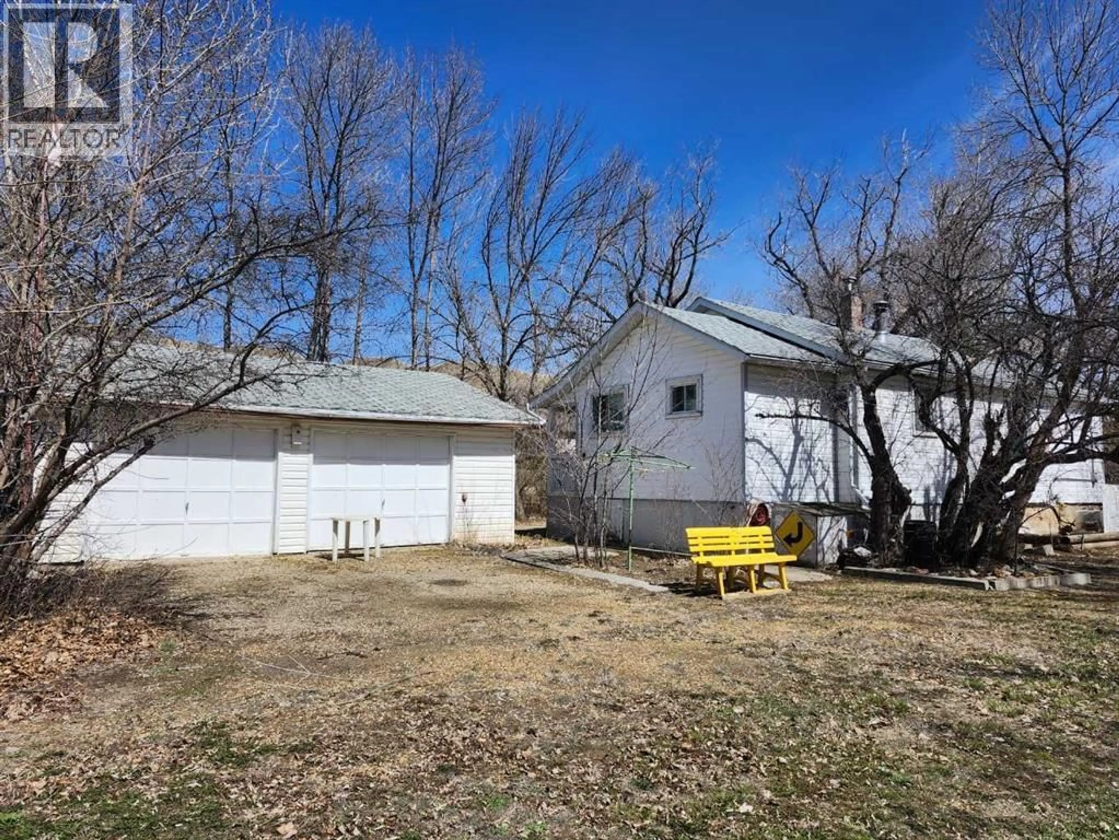 A pic from outside/outdoor area/front of a property/back of a property/a pic from drone, street for 227 6 STREET, Drumheller Alberta T0J1B0