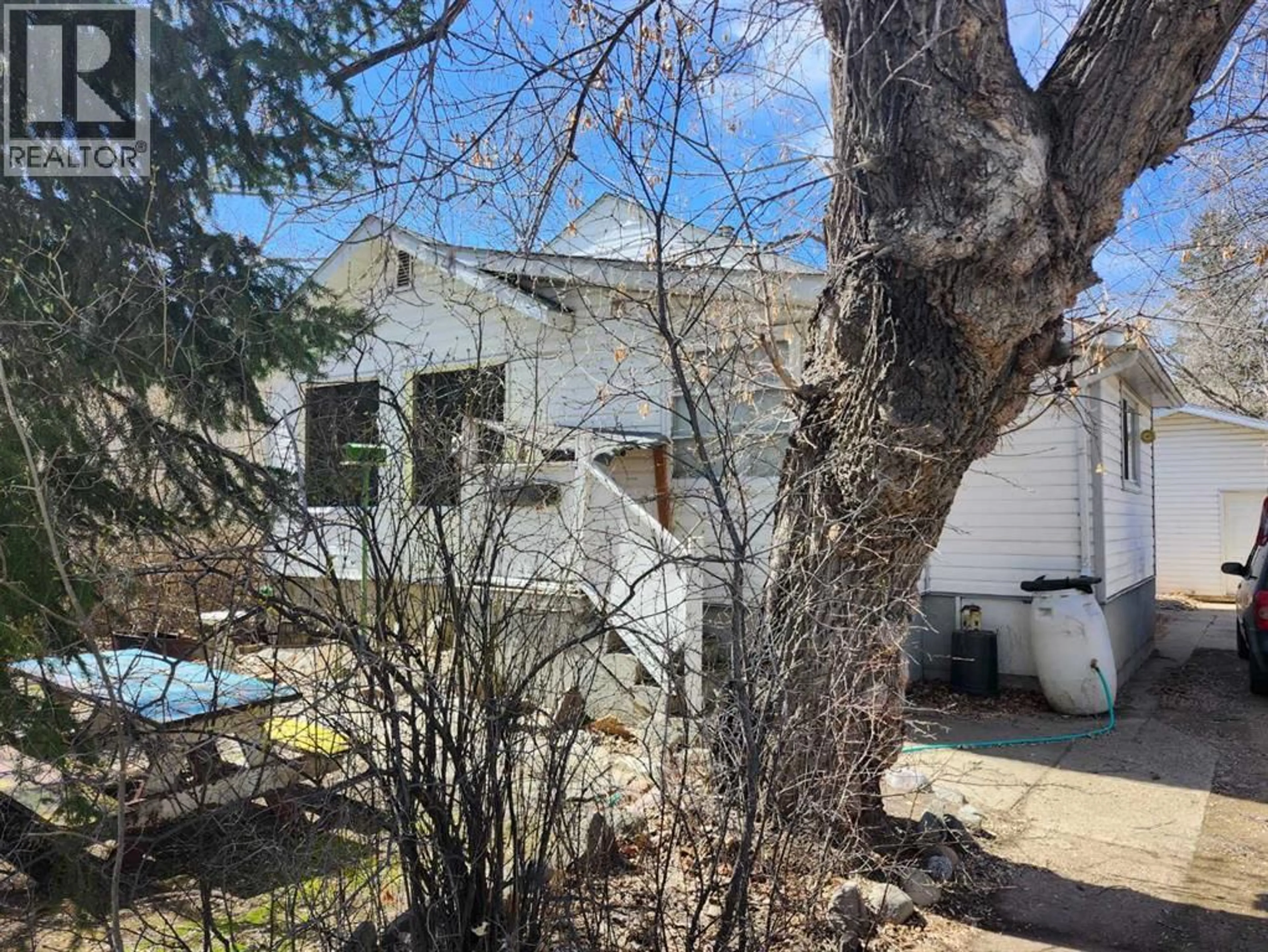 A pic from outside/outdoor area/front of a property/back of a property/a pic from drone, street for 227 6 STREET, Drumheller Alberta T0J1B0