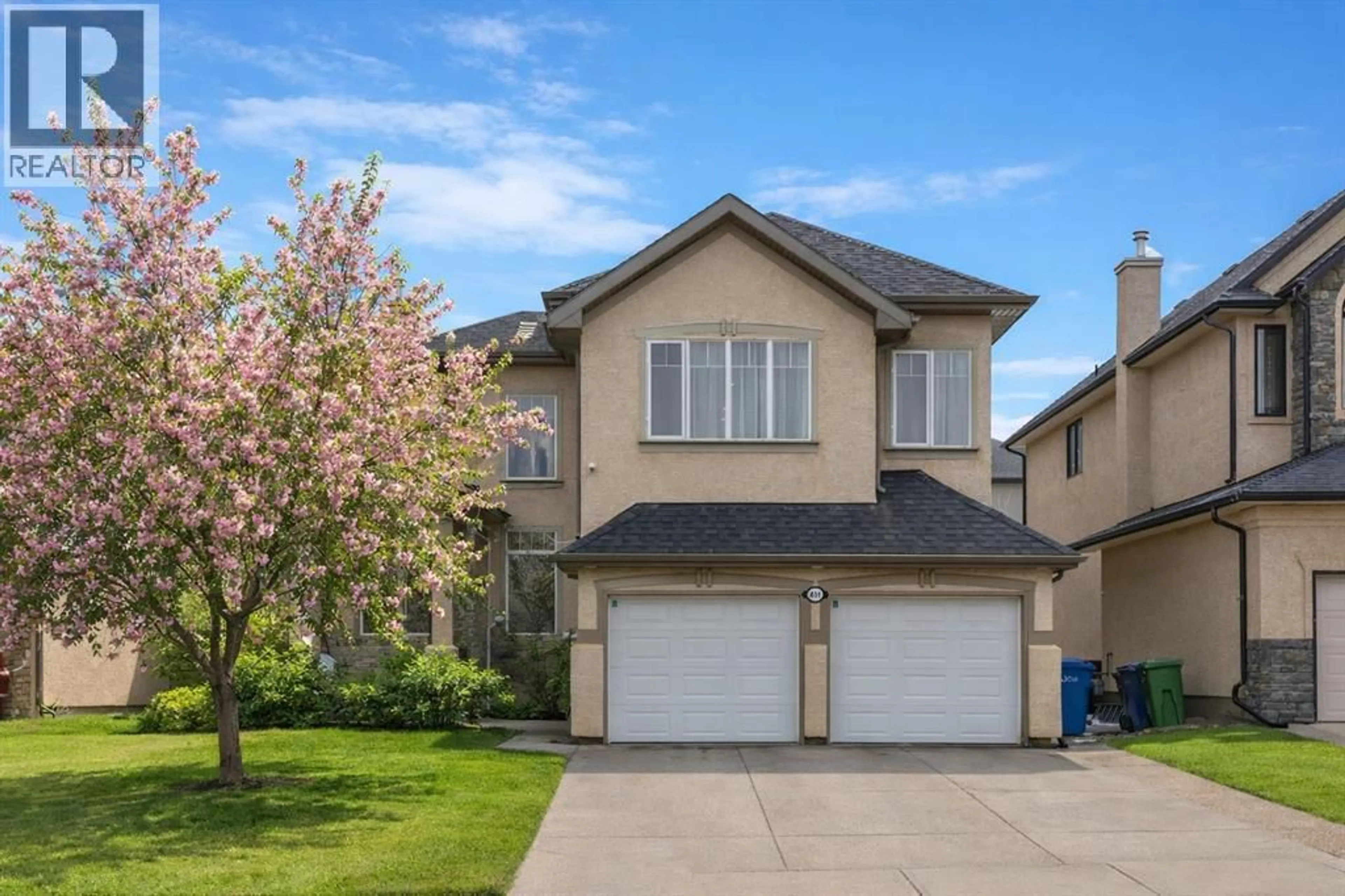 Home with vinyl exterior material, street for 401 MARINA DRIVE, Chestermere Alberta T1X1V8