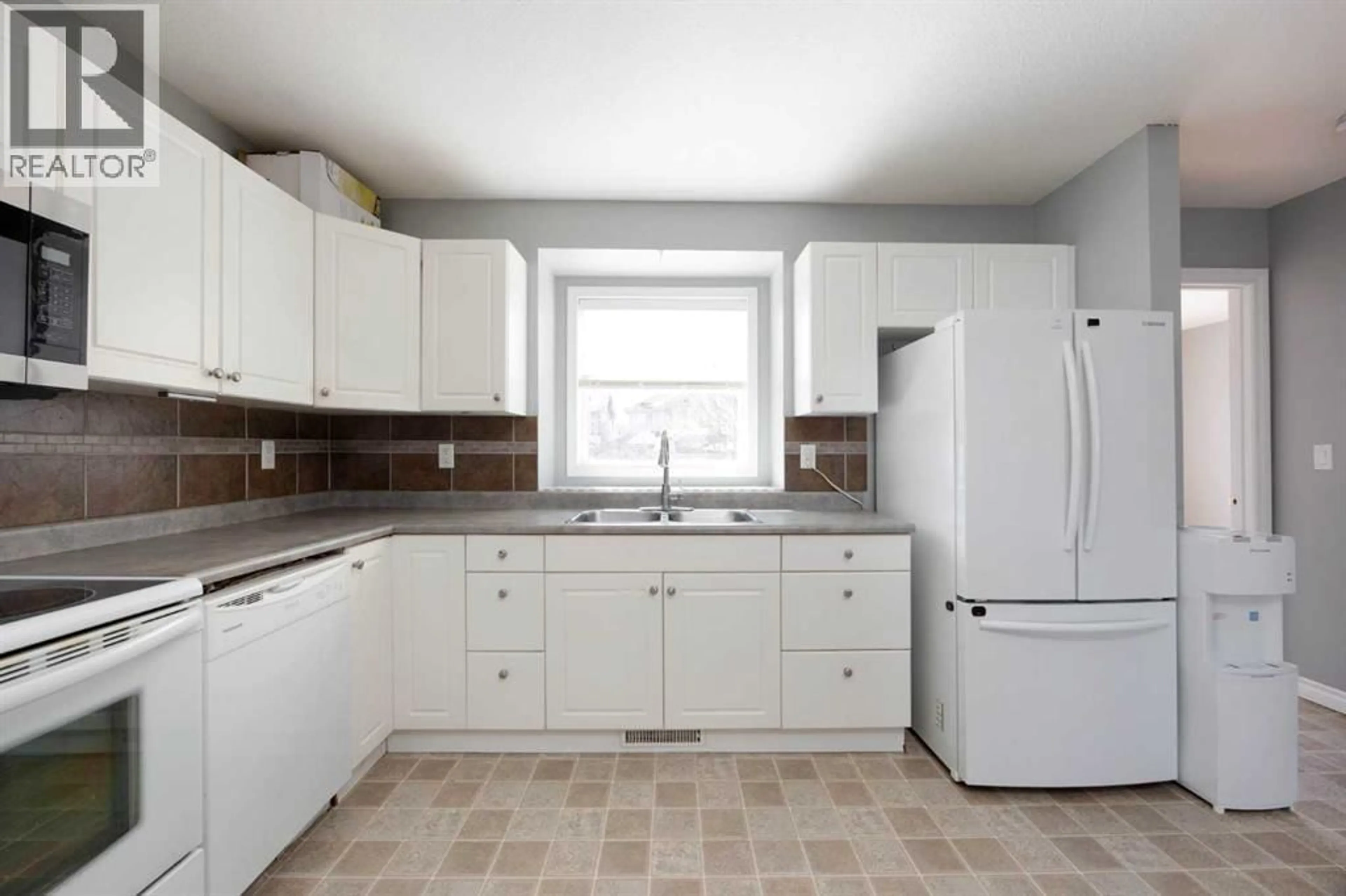 Standard kitchen, ceramic/tile floor for 128 PARRY CRESCENT, Fort McMurray Alberta T9K0A4