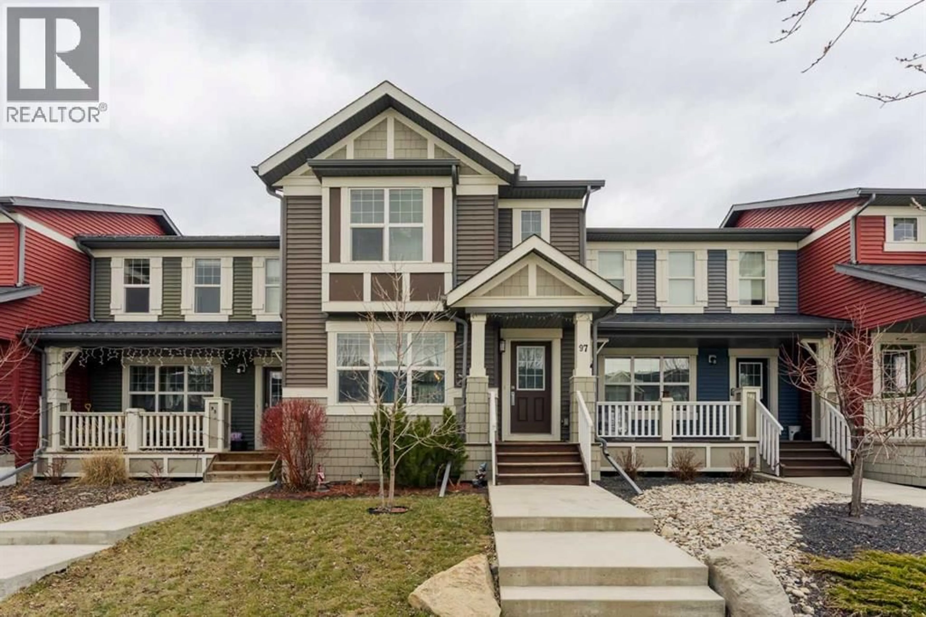 Home with vinyl exterior material, street for 97 SUNVALLEY ROAD, Cochrane Alberta T4C0X7