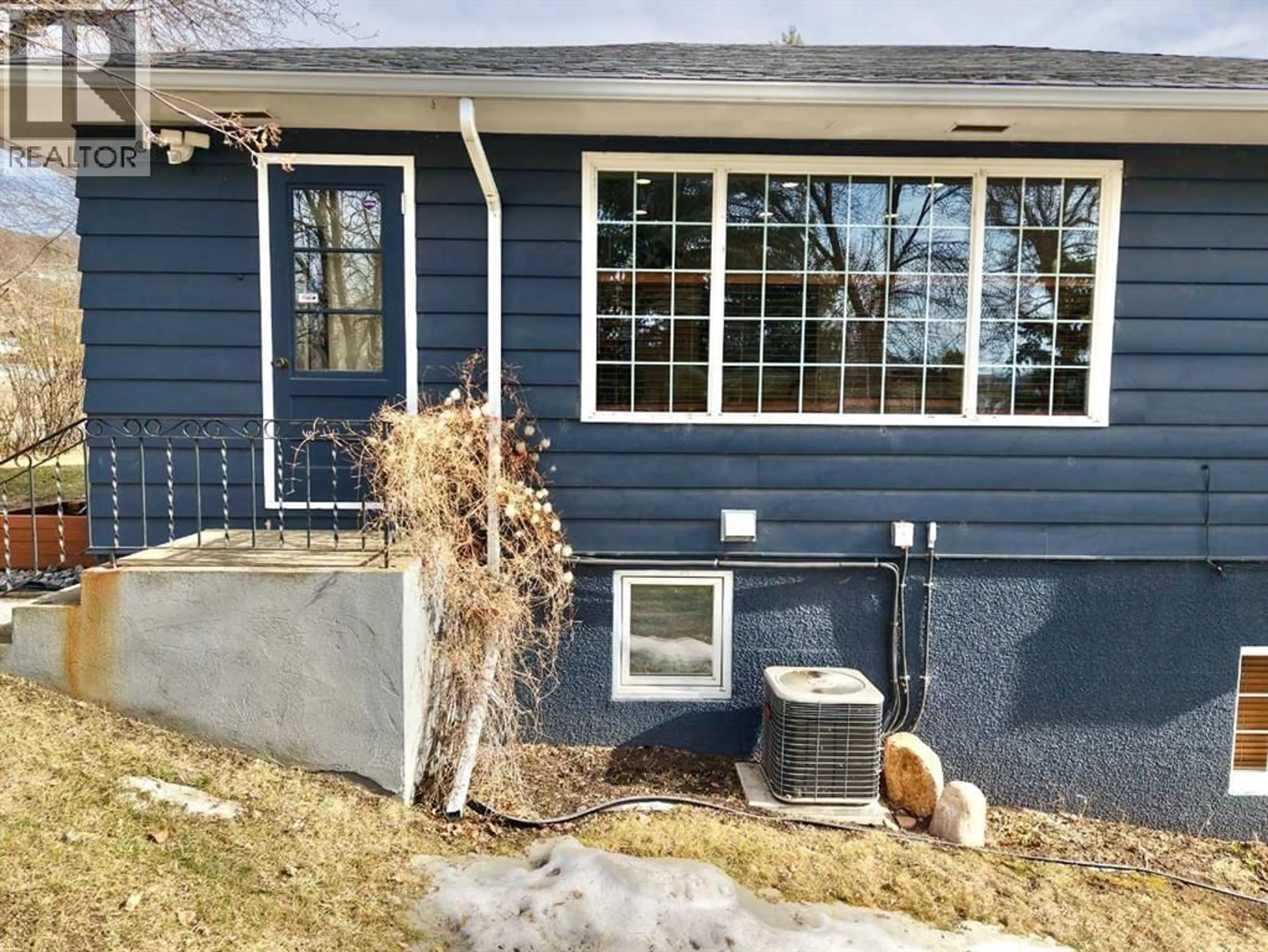 Home with vinyl exterior material, street for 10702 101 STREET, Peace River Alberta T8S1L1