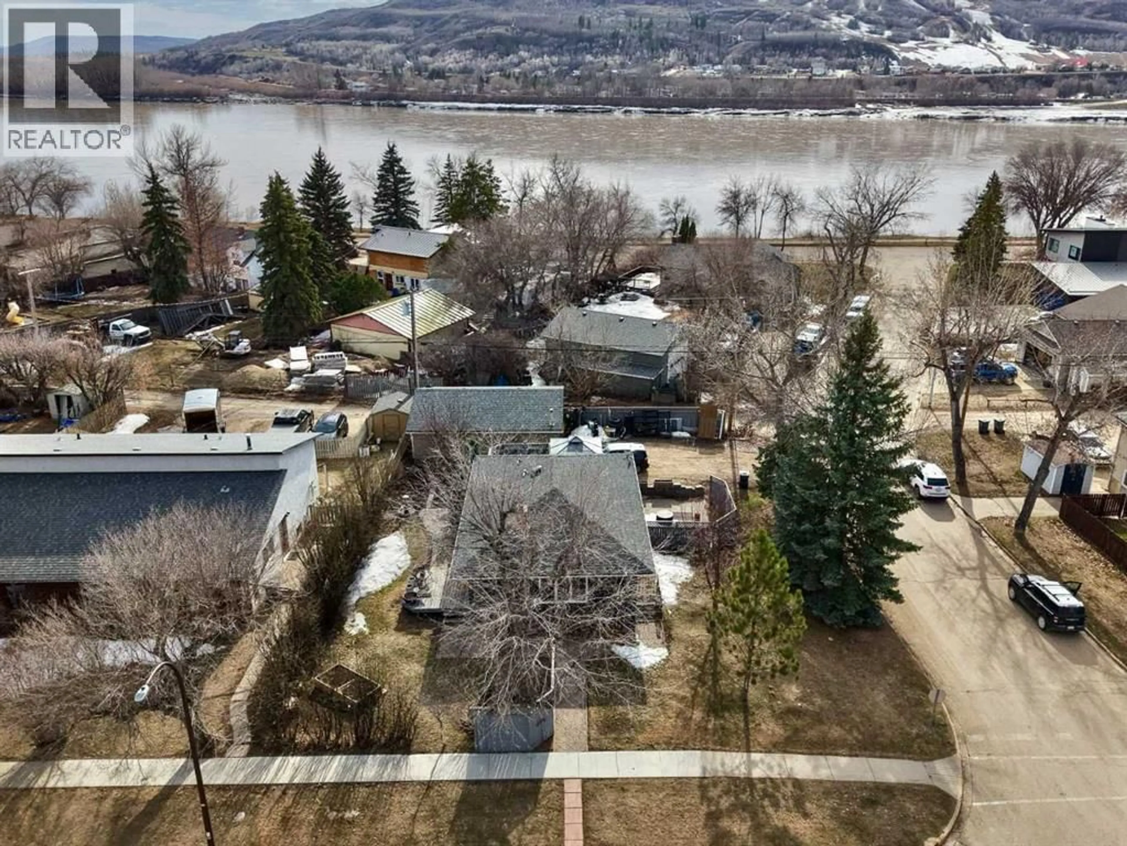 A pic from outside/outdoor area/front of a property/back of a property/a pic from drone, water/lake/river/ocean view for 10702 101 STREET, Peace River Alberta T8S1L1
