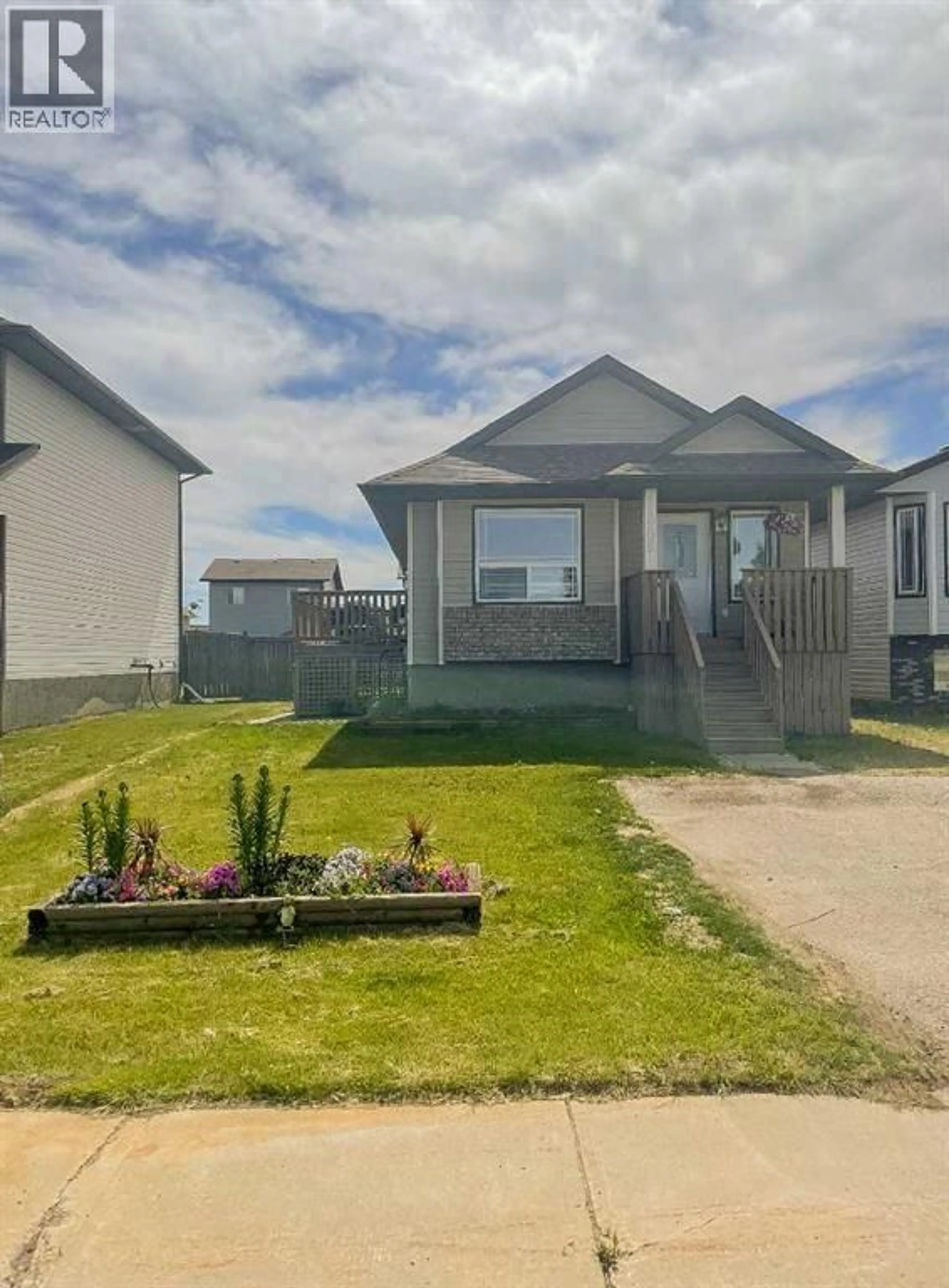 A pic from outside/outdoor area/front of a property/back of a property/a pic from drone, street for 11509 78 AVENUE, Grande Prairie Alberta T8W0A2