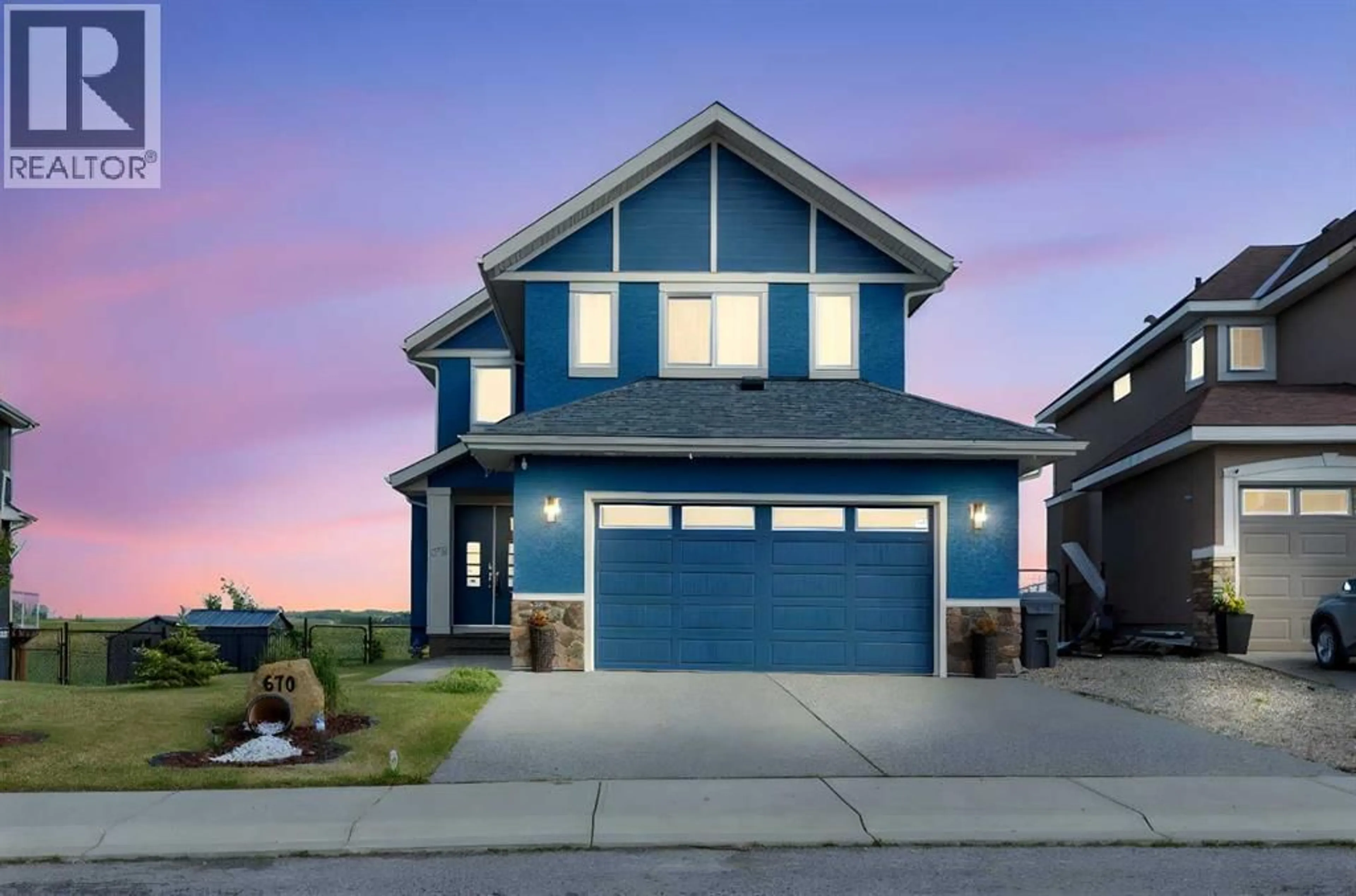 Home with vinyl exterior material, street for 670 MUIRFIELD CRESCENT, Lyalta Alberta T0J1Y1