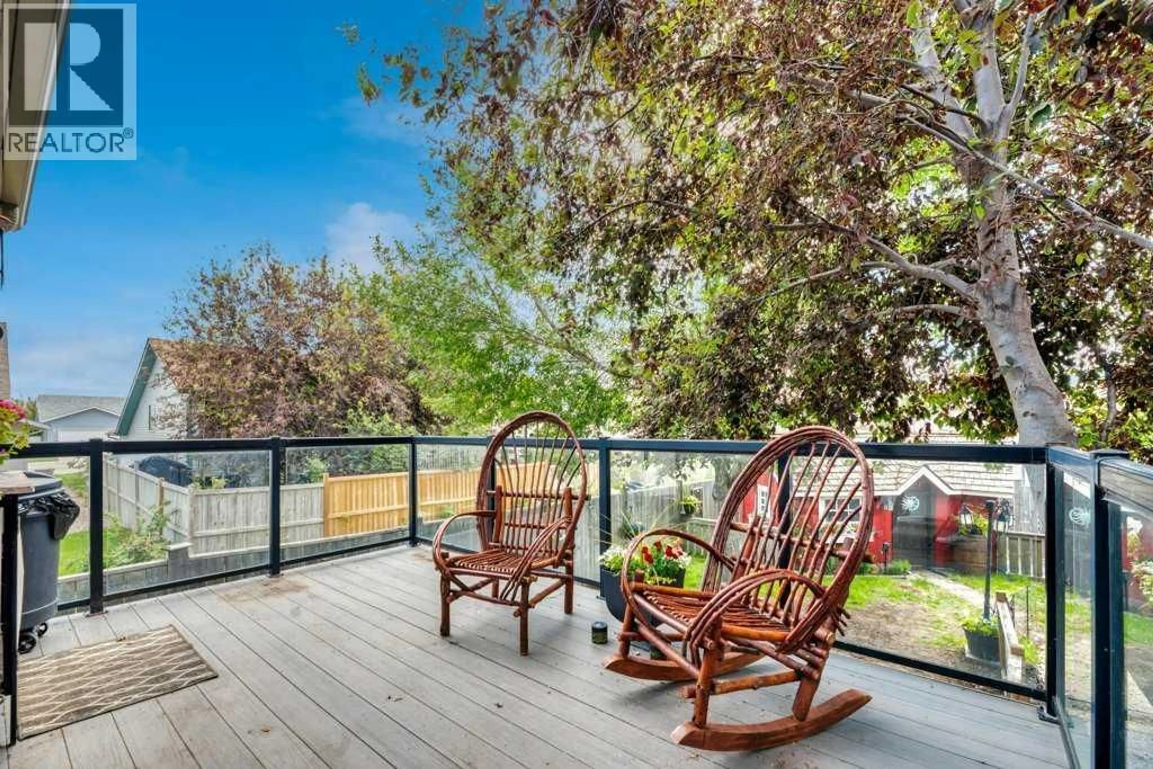 Patio, water/lake/river/ocean view for 1924 STRATHCONA TERRACE, Strathmore Alberta T1P1S1