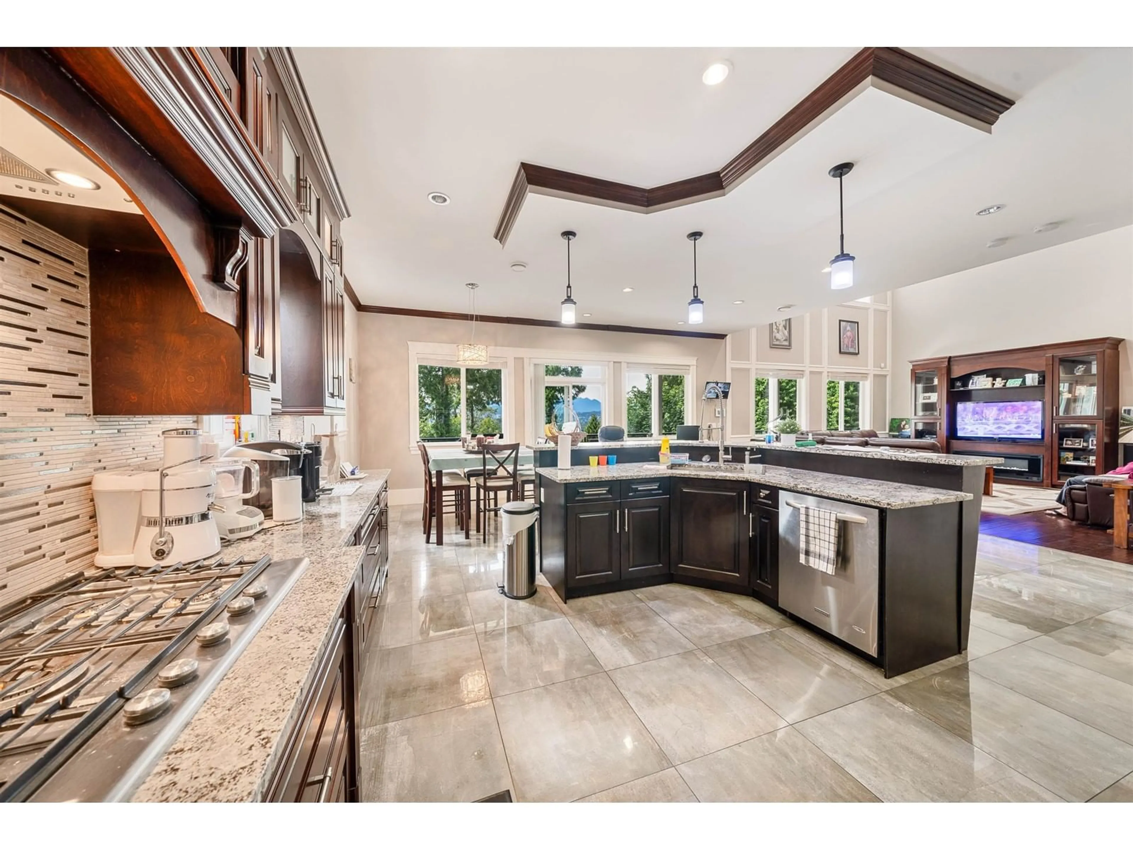 Open concept kitchen, ceramic/tile floor for 12701 107A, Surrey British Columbia V3V3J3