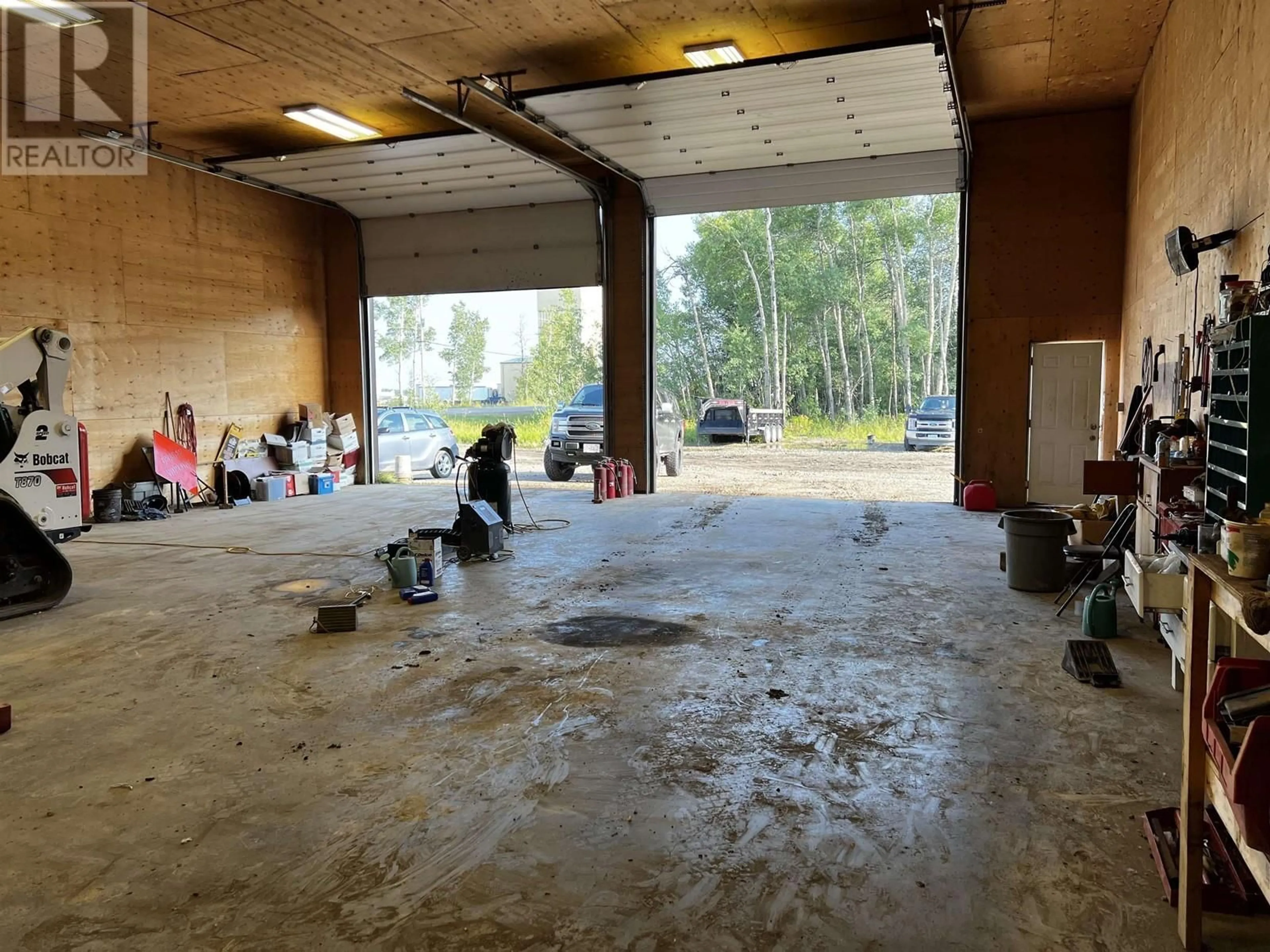 Indoor garage for 10412 NORTHERN LIGHTS DRIVE, Fort St. John British Columbia V1J0S8