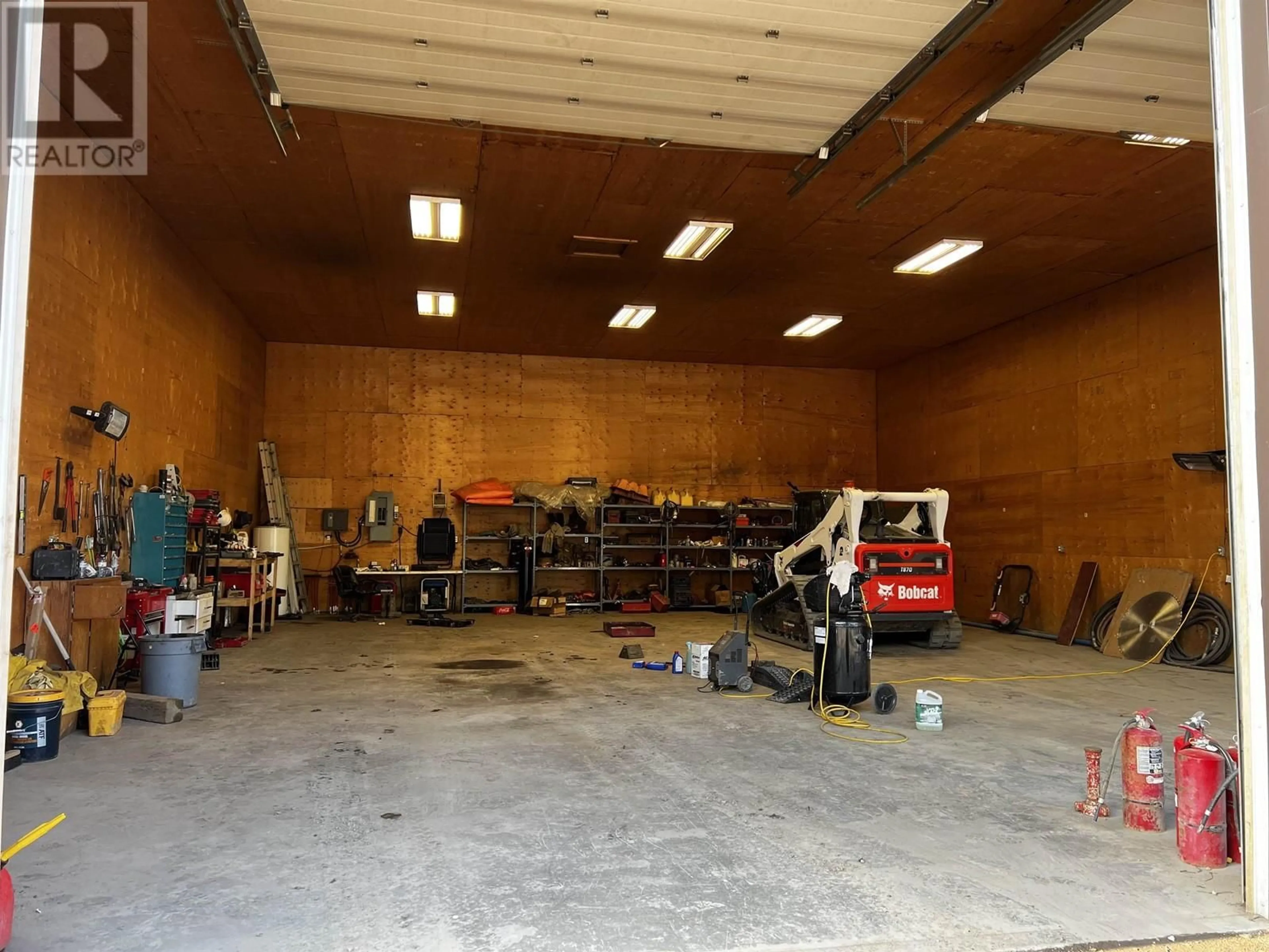 Indoor garage for 10412 NORTHERN LIGHTS DRIVE, Fort St. John British Columbia V1J0S8