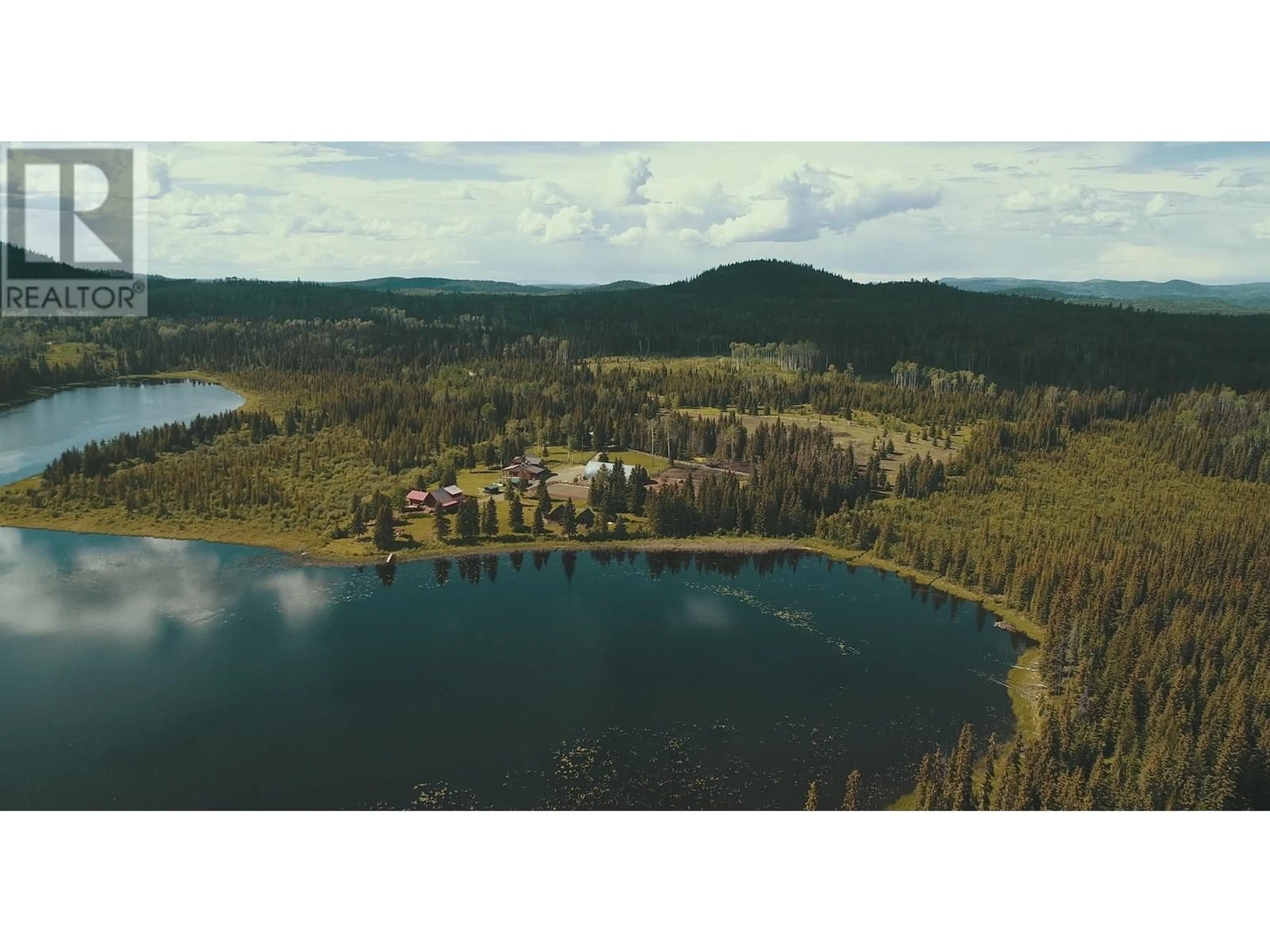 A pic from outside/outdoor area/front of a property/back of a property/a pic from drone, water/lake/river/ocean view for 9550 EAGAN LAKE ROAD, Bridge Lake British Columbia V0K1E0