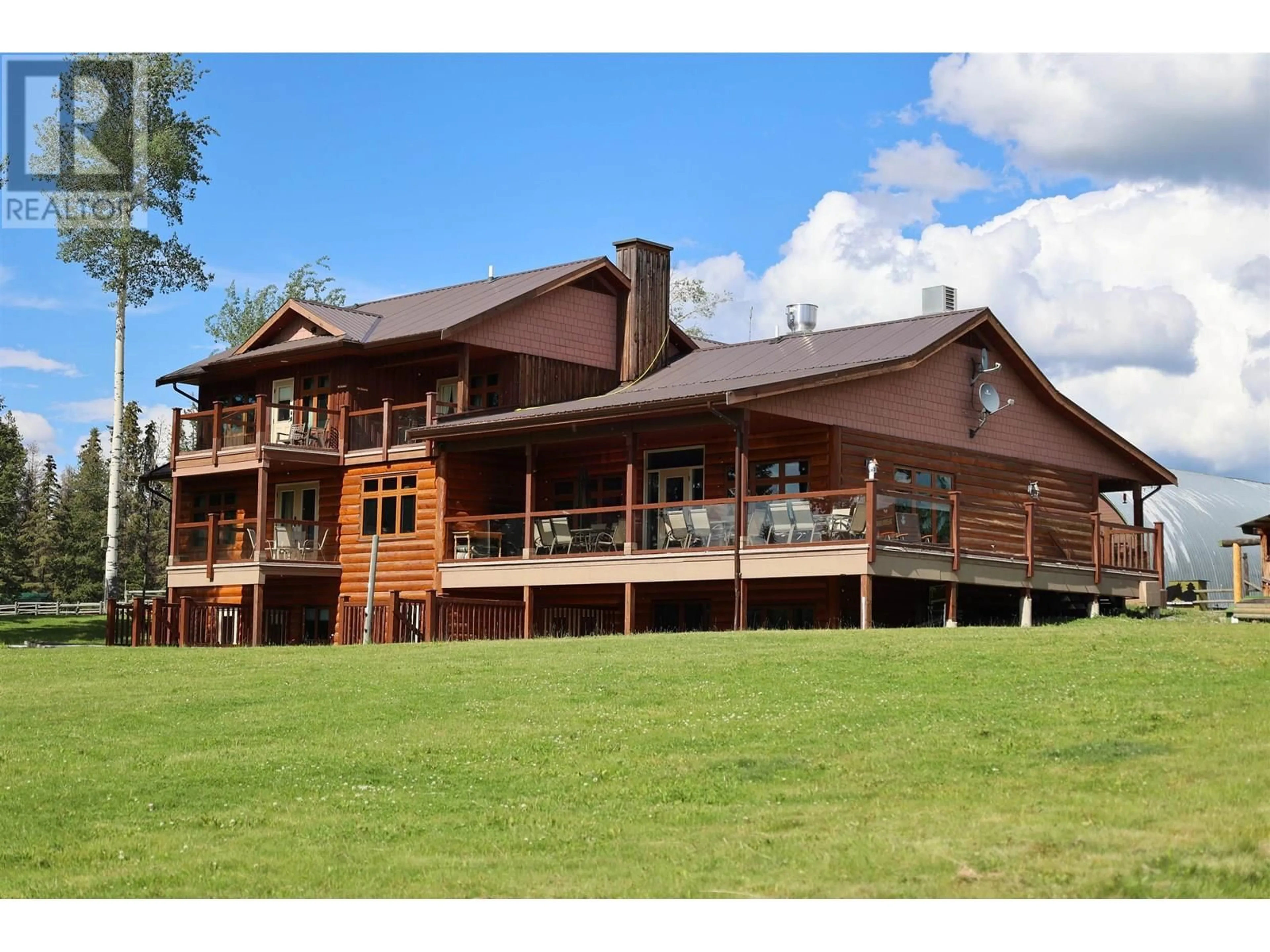 A pic from outside/outdoor area/front of a property/back of a property/a pic from drone, building for 9550 EAGAN LAKE ROAD, Bridge Lake British Columbia V0K1E0