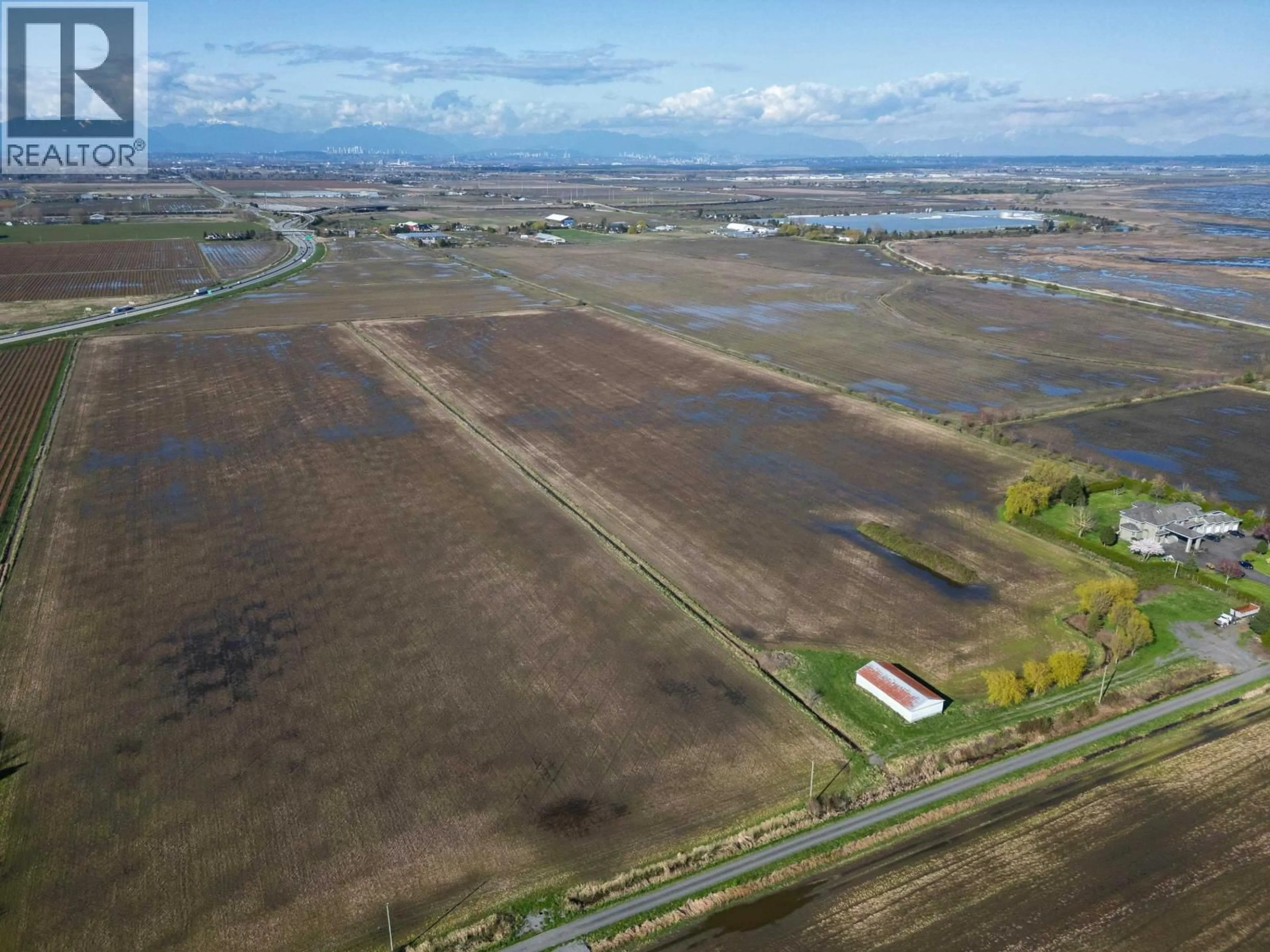 A pic from outside/outdoor area/front of a property/back of a property/a pic from drone, water/lake/river/ocean view for 2150 56 STREET, Delta British Columbia V4L2B1