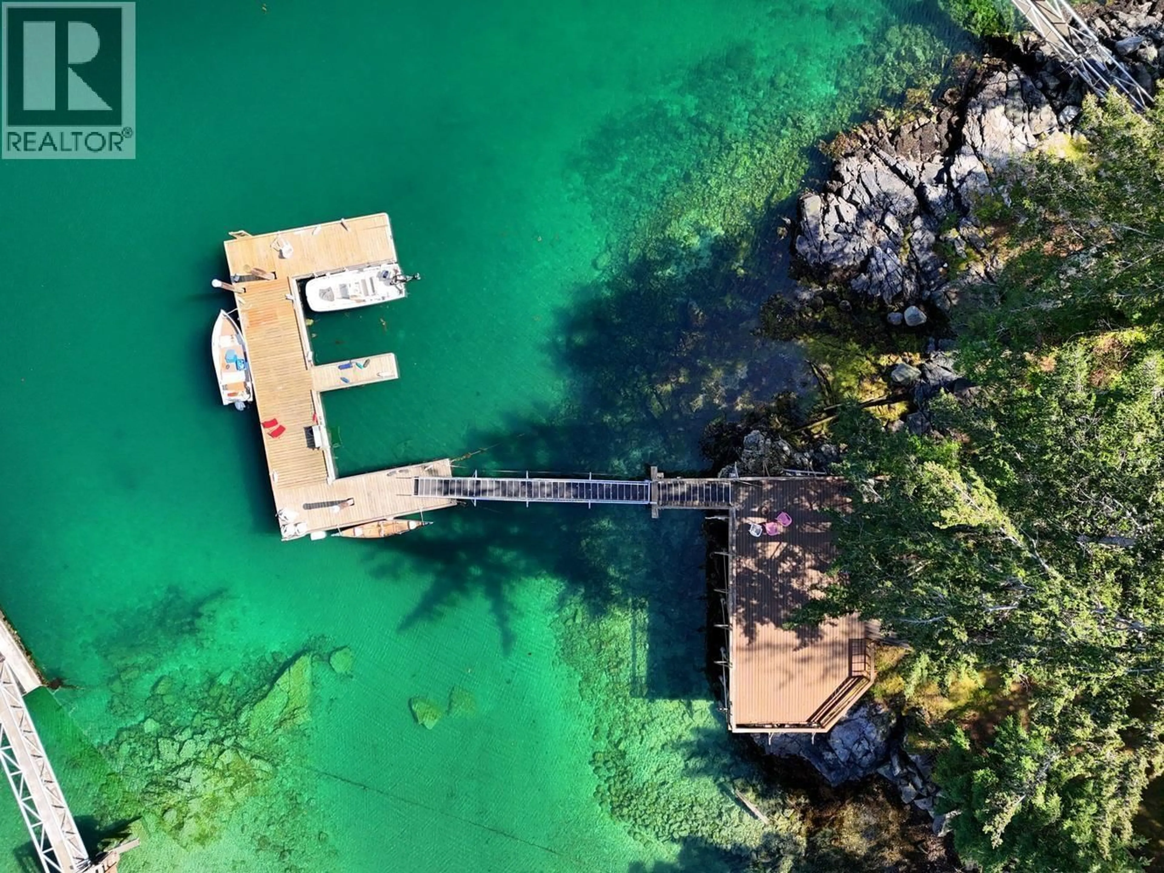 A pic from outside/outdoor area/front of a property/back of a property/a pic from drone, water/lake/river/ocean view for 4737 DAVIS ROAD, Madeira Park British Columbia V0N2H1