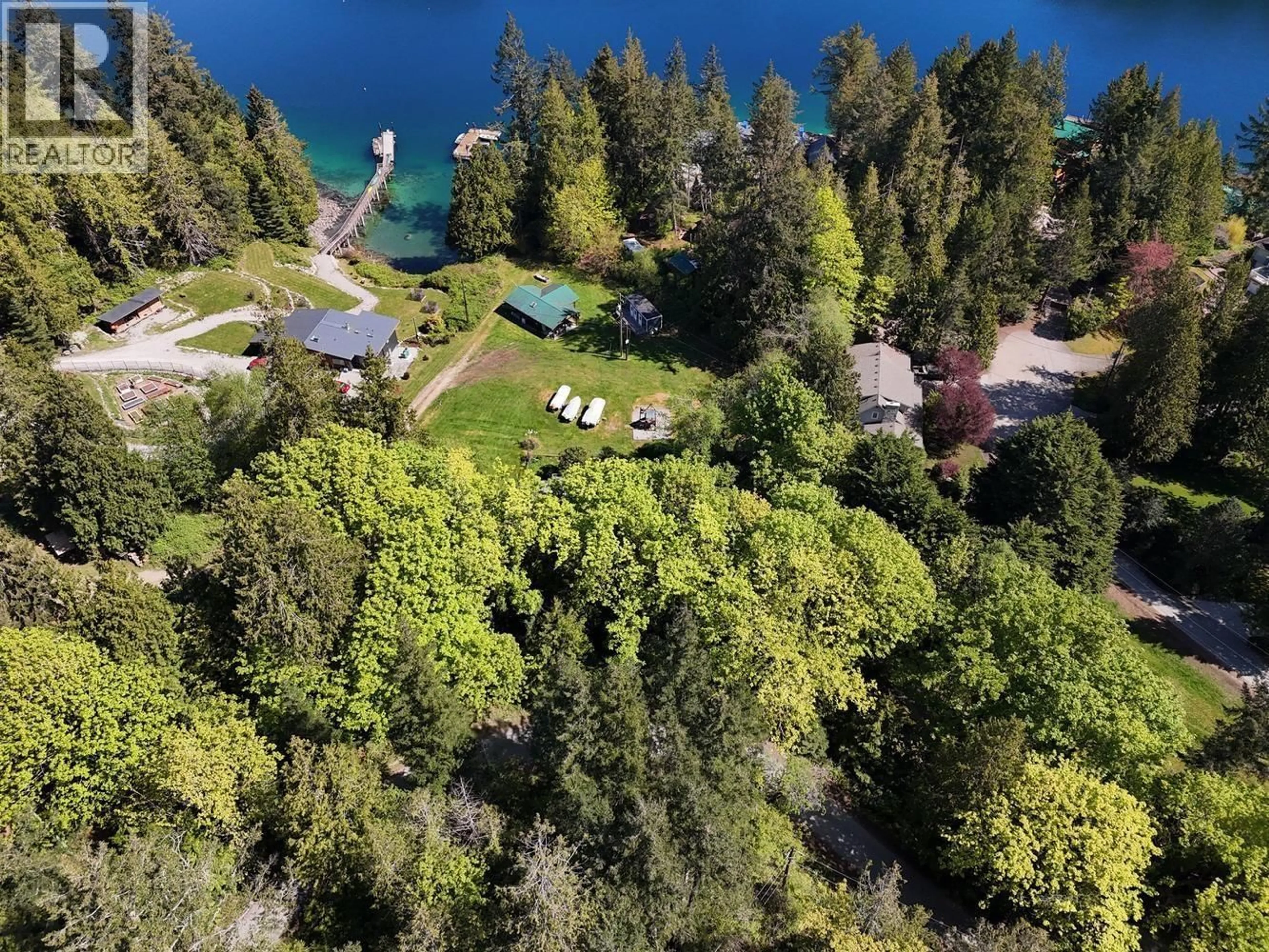 A pic from outside/outdoor area/front of a property/back of a property/a pic from drone, water/lake/river/ocean view for 4737 DAVIS ROAD, Madeira Park British Columbia V0N2H1