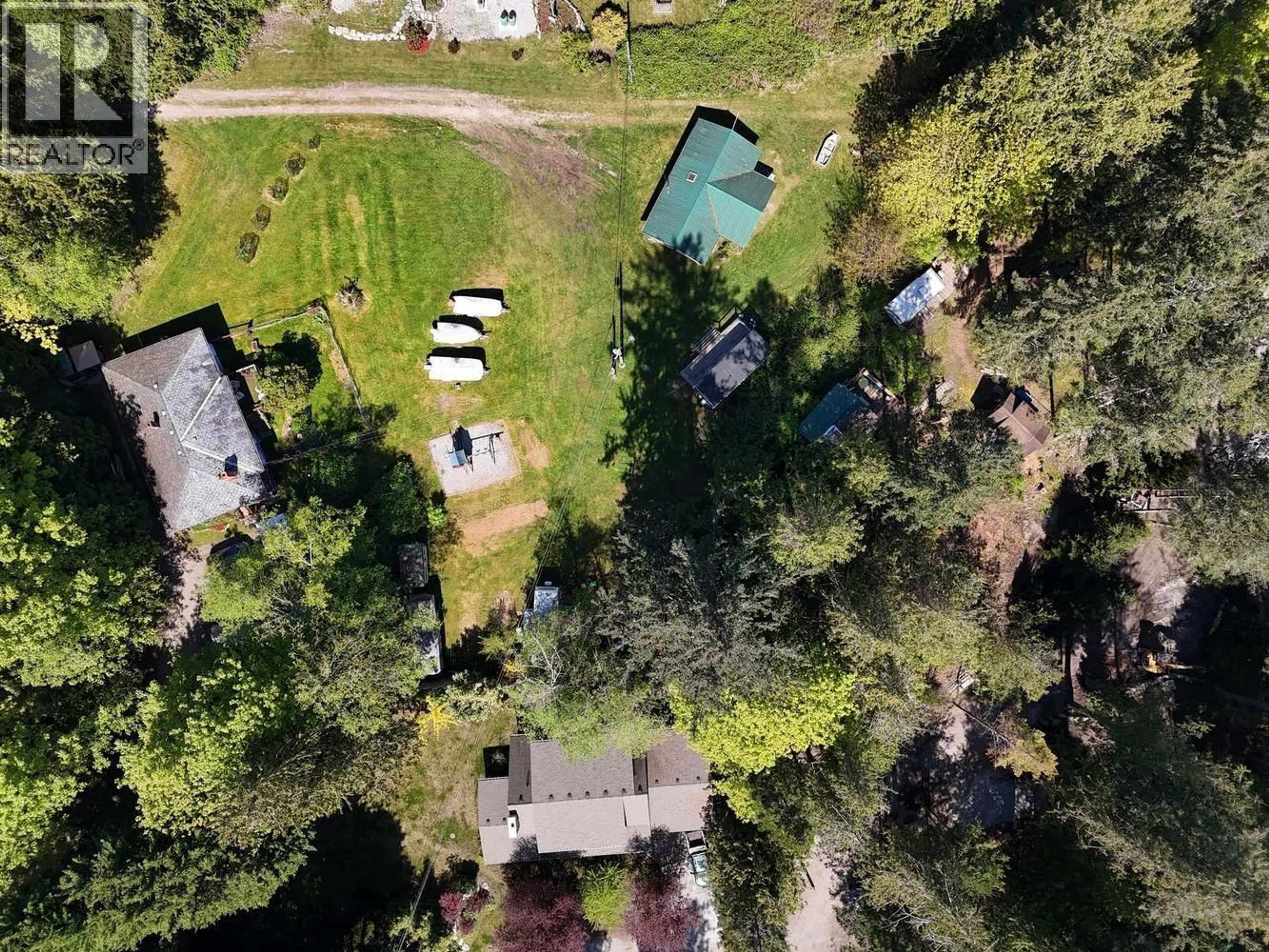 A pic from outside/outdoor area/front of a property/back of a property/a pic from drone, forest/trees view for 4737 DAVIS ROAD, Madeira Park British Columbia V0N2H1