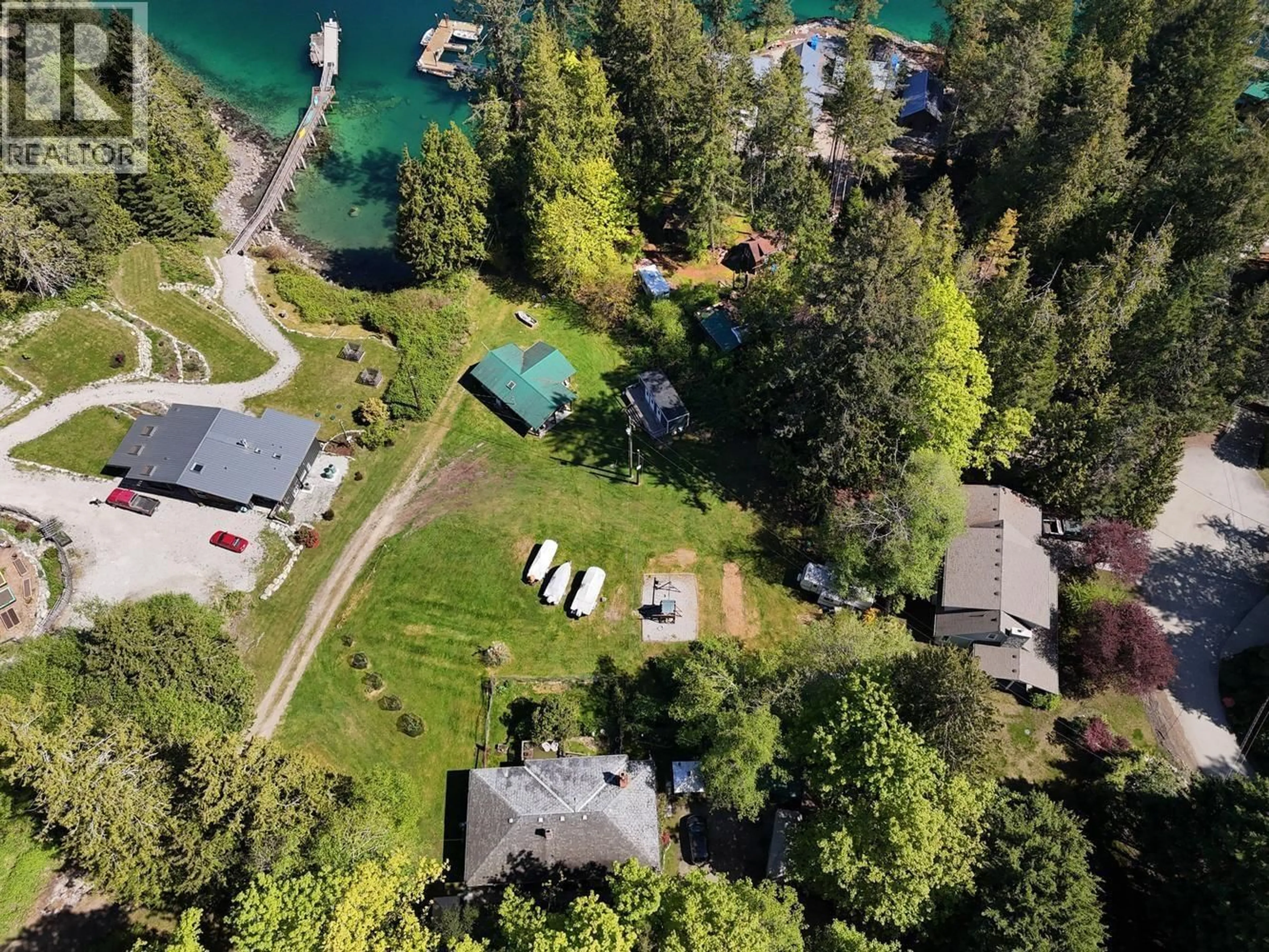 A pic from outside/outdoor area/front of a property/back of a property/a pic from drone, water/lake/river/ocean view for 4737 DAVIS ROAD, Madeira Park British Columbia V0N2H1