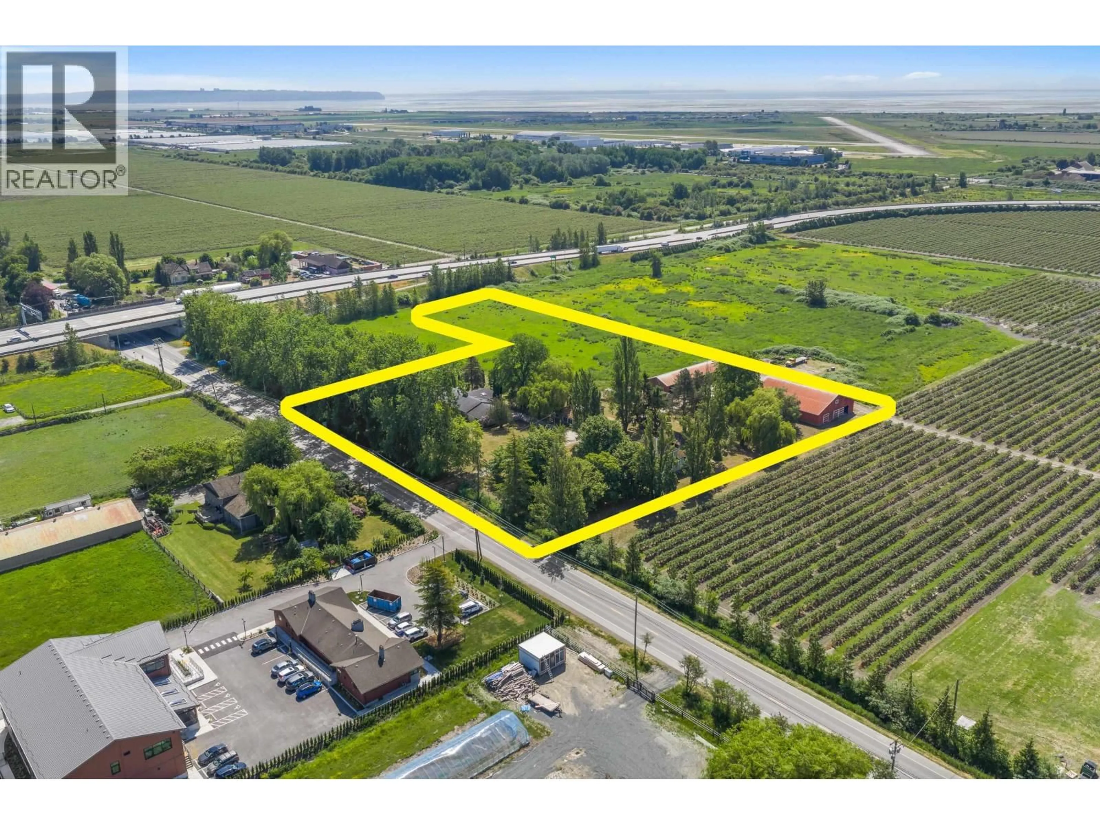 A pic from outside/outdoor area/front of a property/back of a property/a pic from drone, unknown for 7064 LADNER TRUNK ROAD, Delta British Columbia V4K3N3