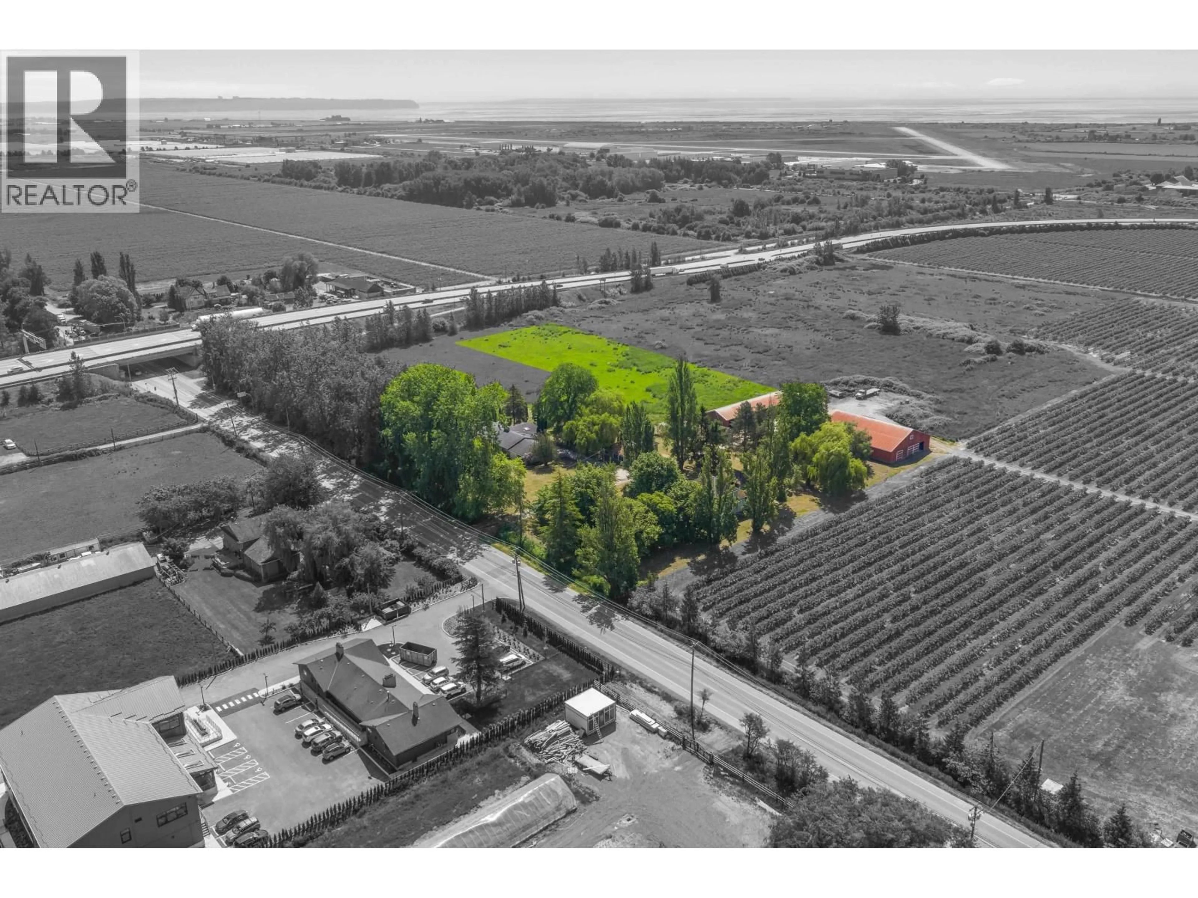 A pic from outside/outdoor area/front of a property/back of a property/a pic from drone, building for 7064 LADNER TRUNK ROAD, Delta British Columbia V4K3N3