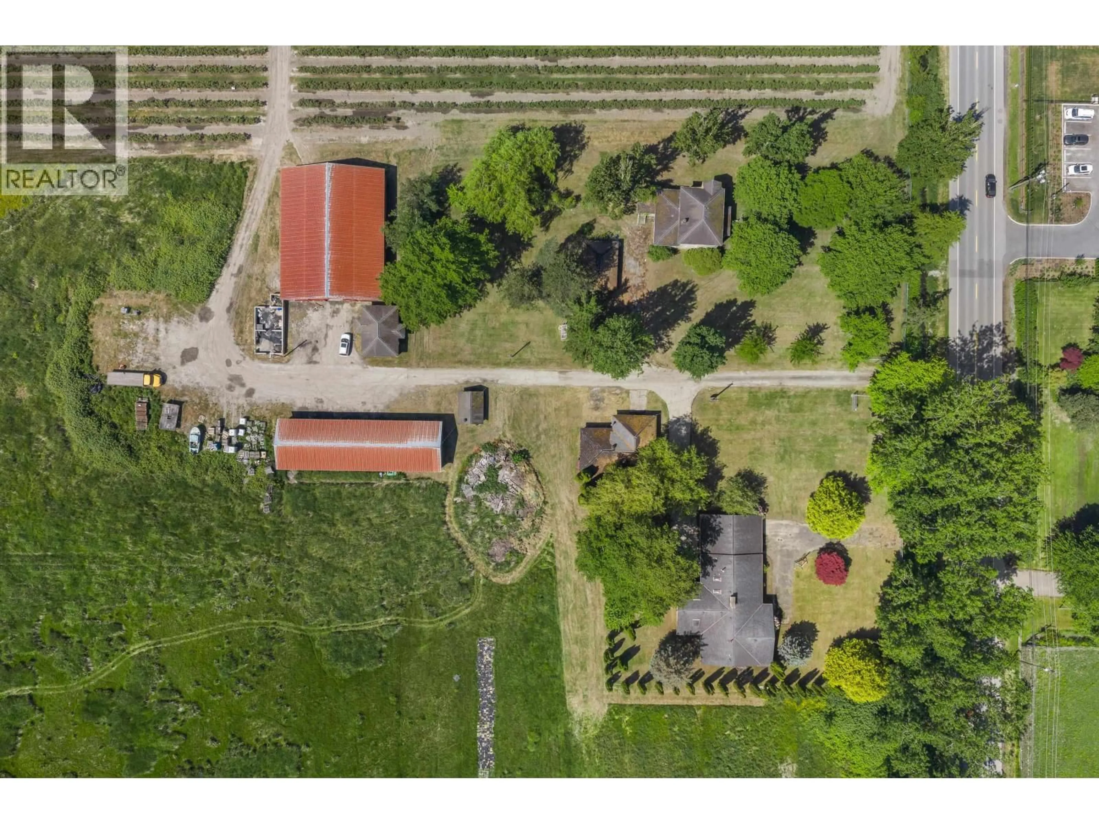 A pic from outside/outdoor area/front of a property/back of a property/a pic from drone, unknown for 7064 LADNER TRUNK ROAD, Delta British Columbia V4K3N3