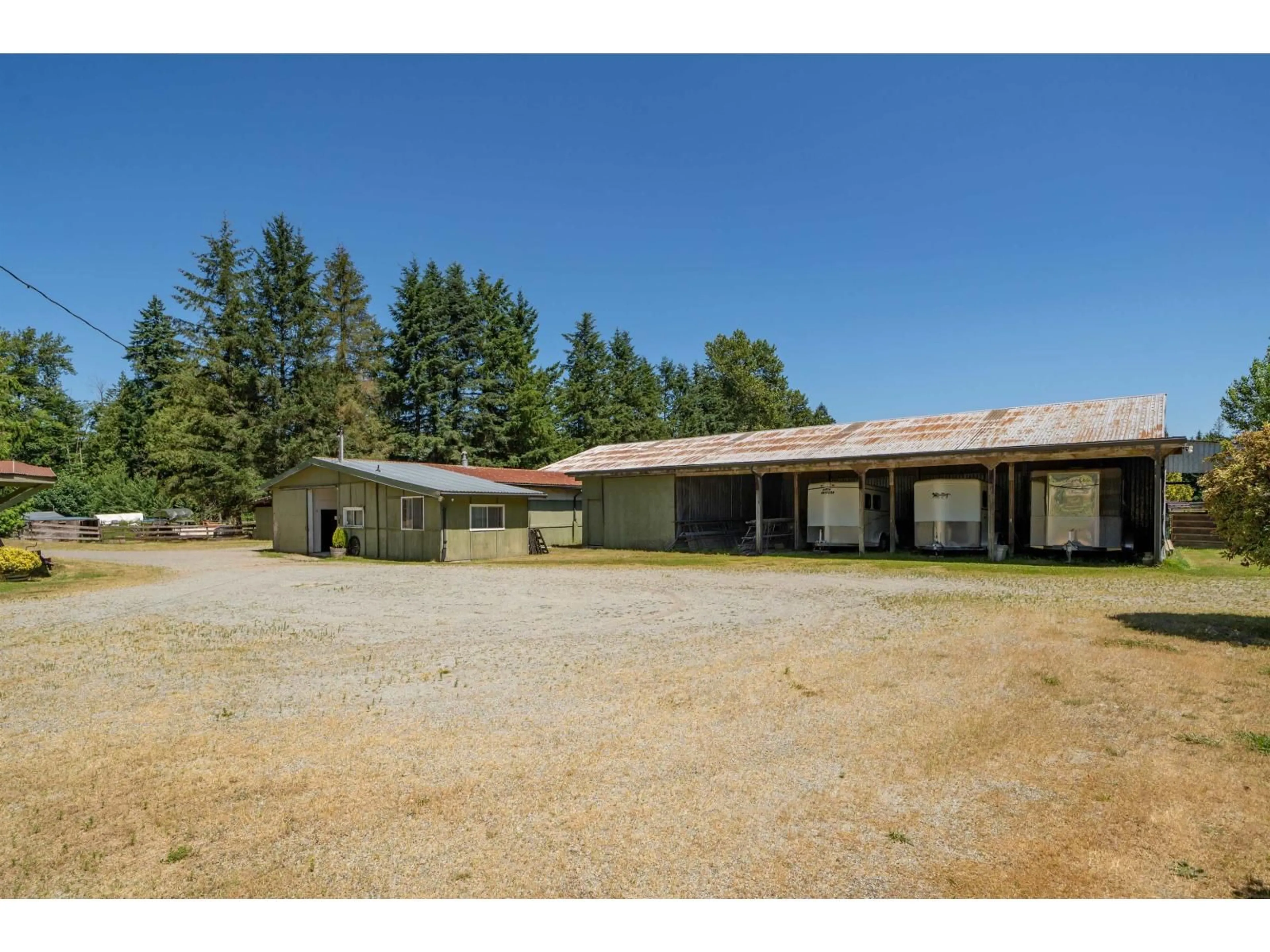 A pic from outside/outdoor area/front of a property/back of a property/a pic from drone, building for 25177 64 AVENUE, Langley British Columbia V4W1H5