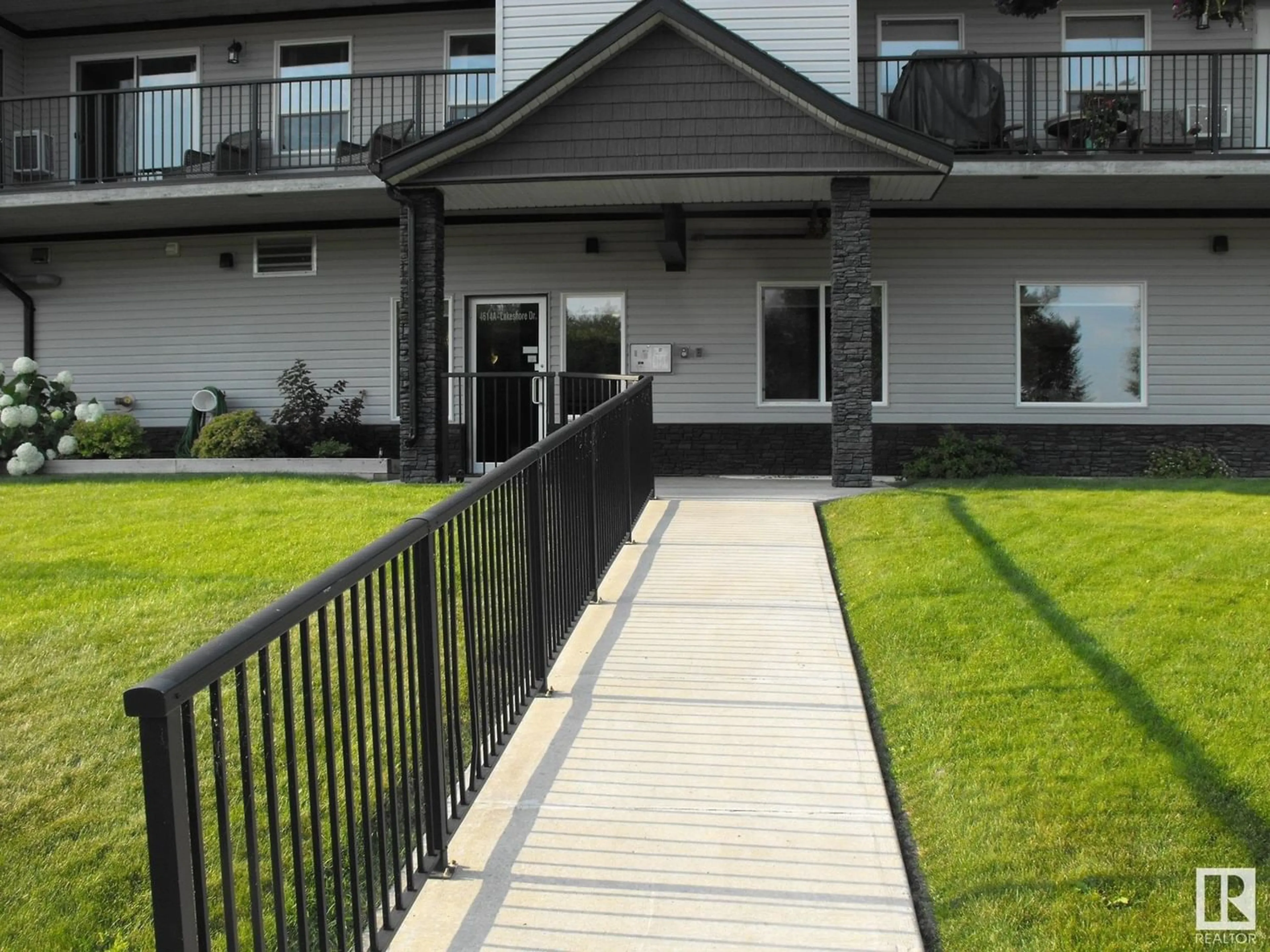 A pic from exterior of the house or condo, the fenced backyard for #405 4614A Lakeshore DR, St. Paul Town Alberta T0A3A3