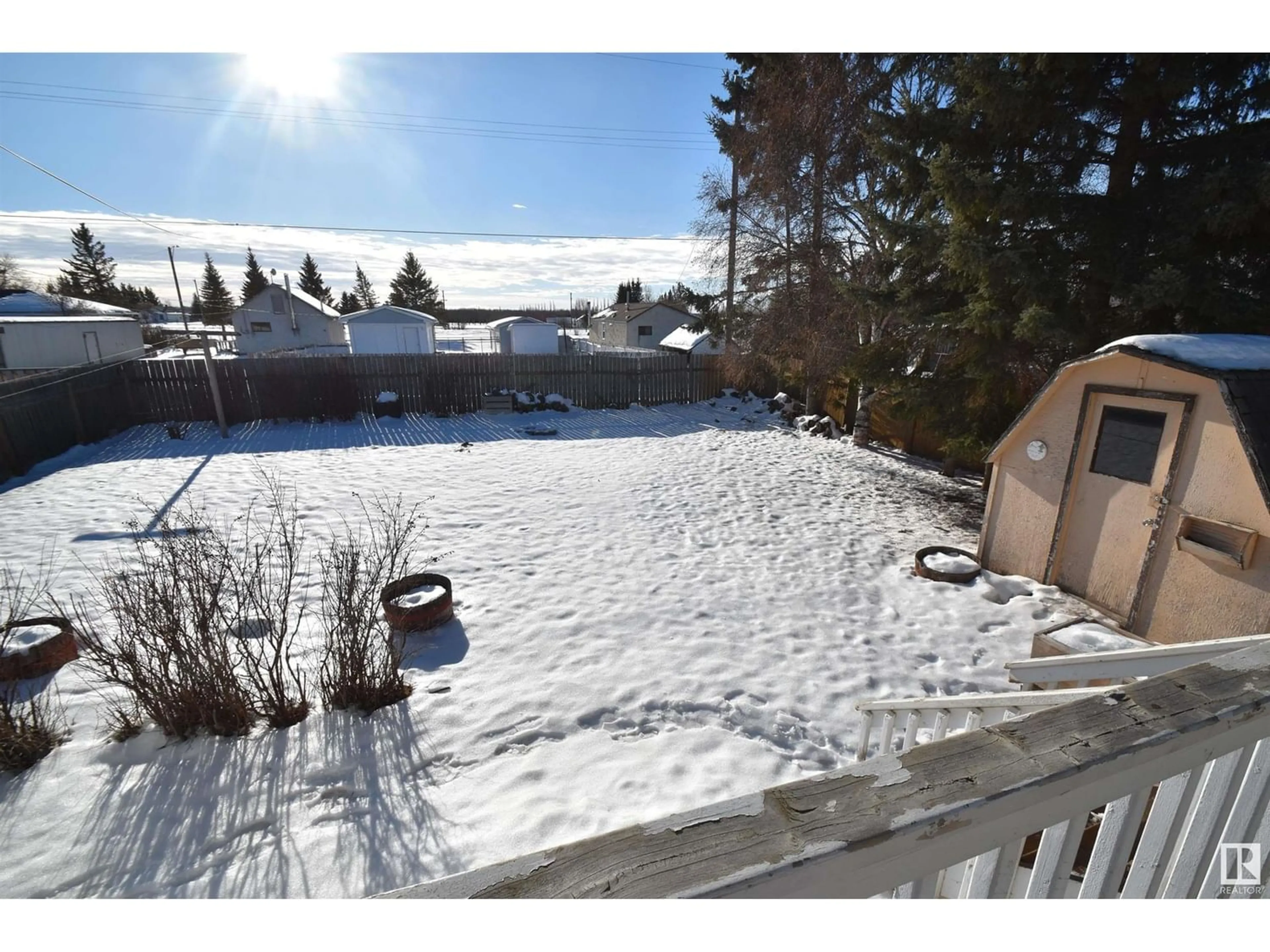 A pic from exterior of the house or condo, the fenced backyard for 5131 51 ST, Vilna Alberta T0A3L0