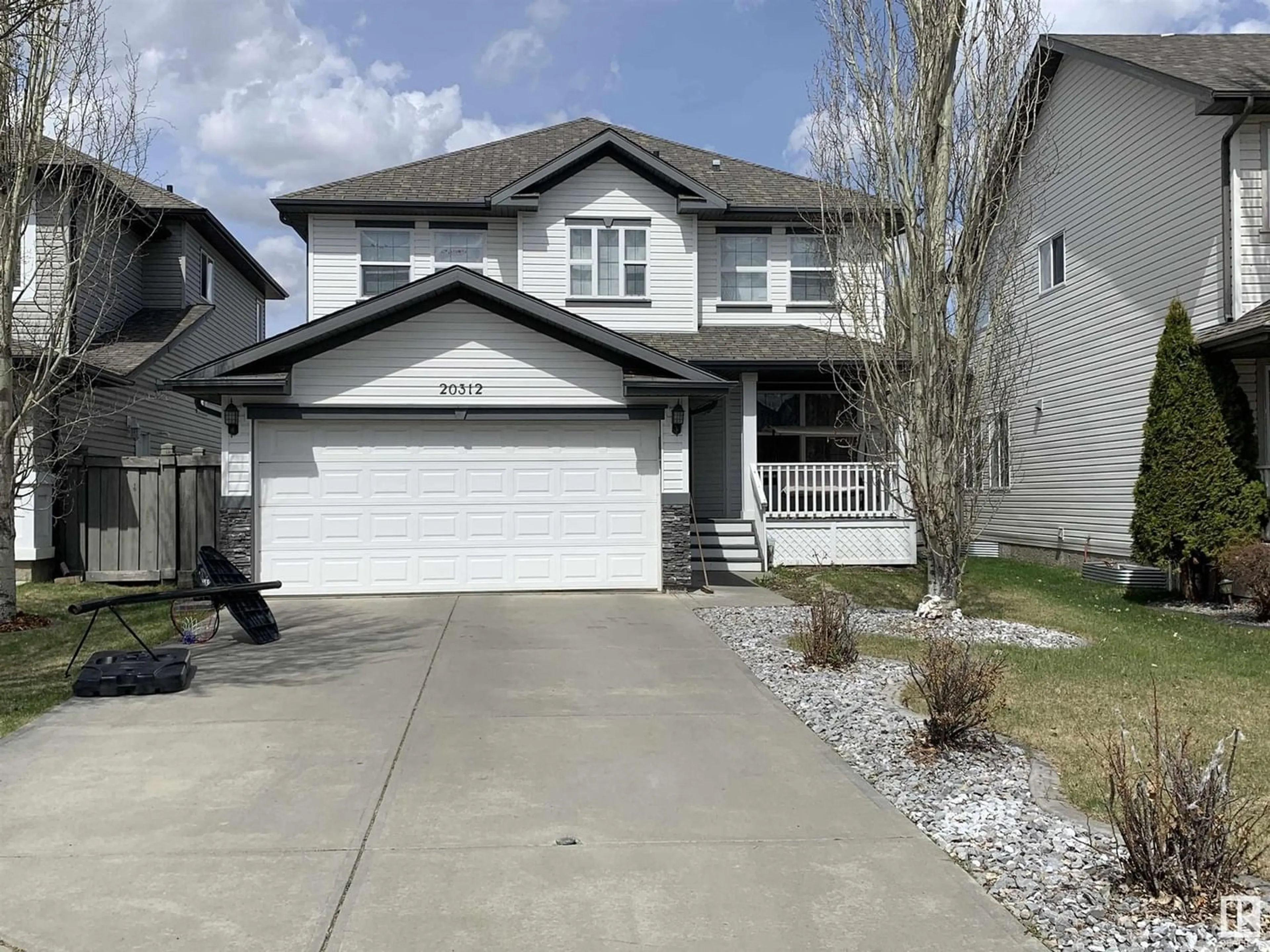 Frontside or backside of a home for 20312 47 AV NW, Edmonton Alberta T6M0A6