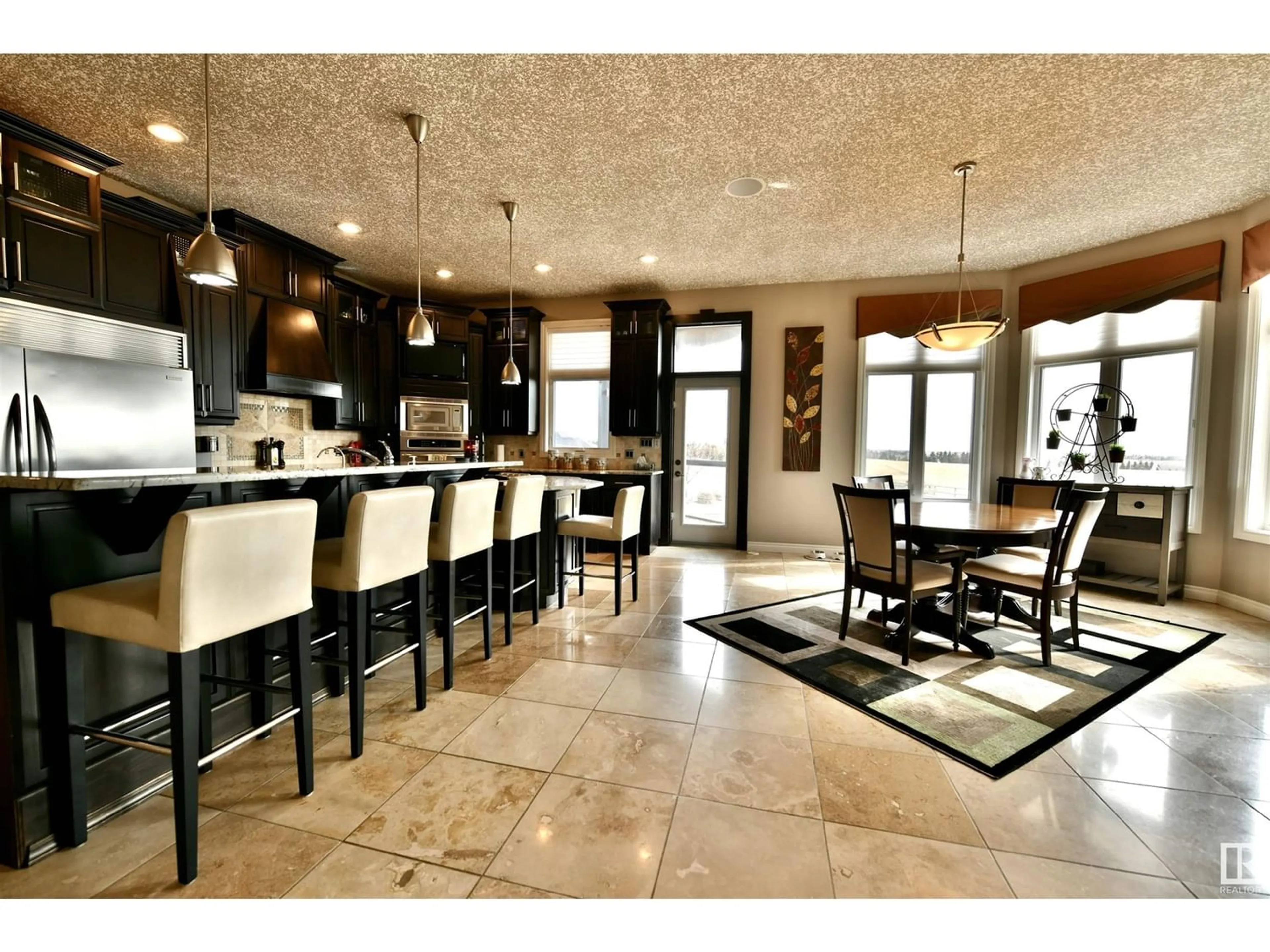 Open concept kitchen for 58124 RR 90, Rural St. Paul County Alberta T0A3A0