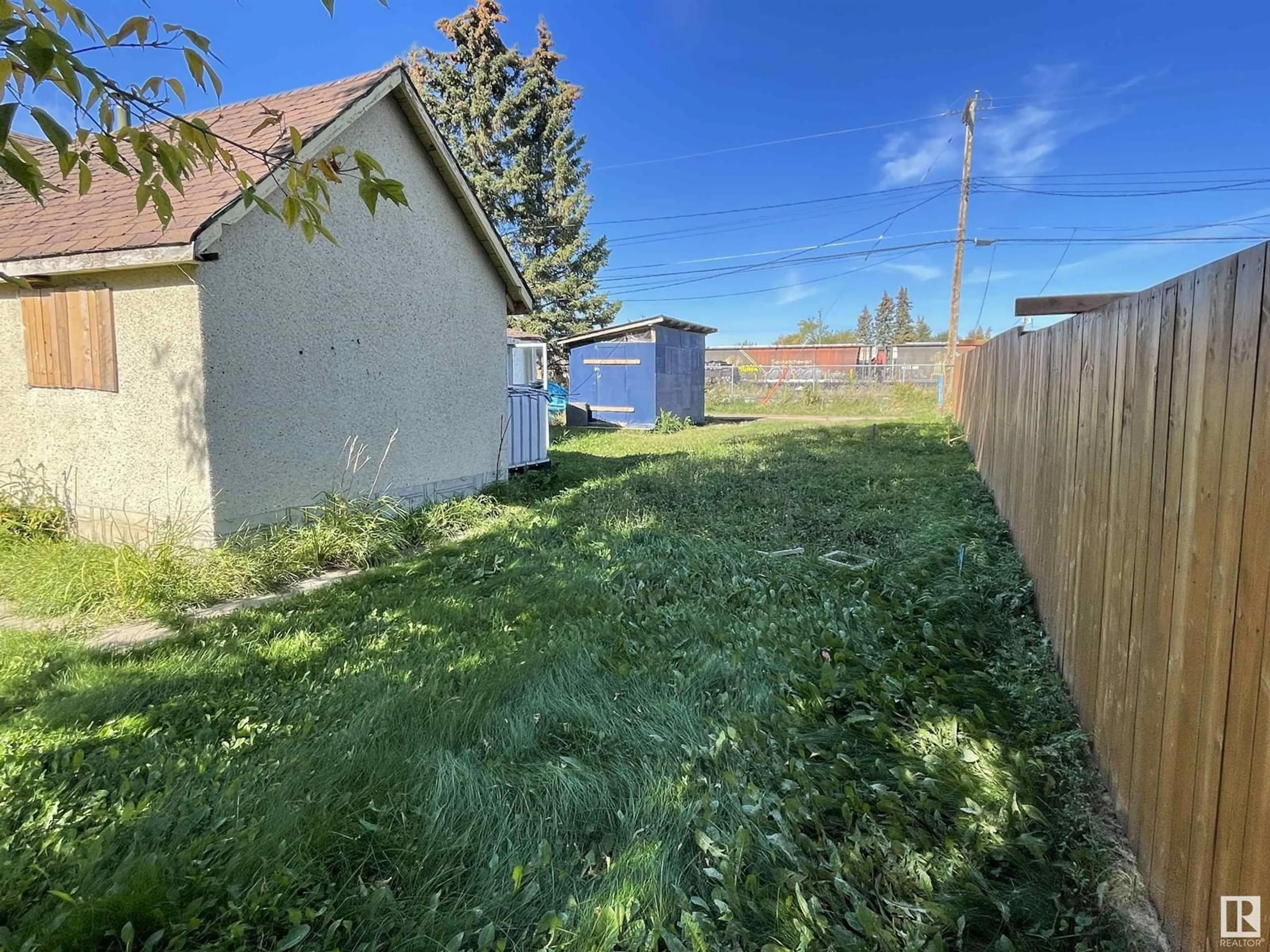 A pic from outside/outdoor area/front of a property/back of a property/a pic from drone, street for 9832 107 ST, Westlock Alberta T7P1R5