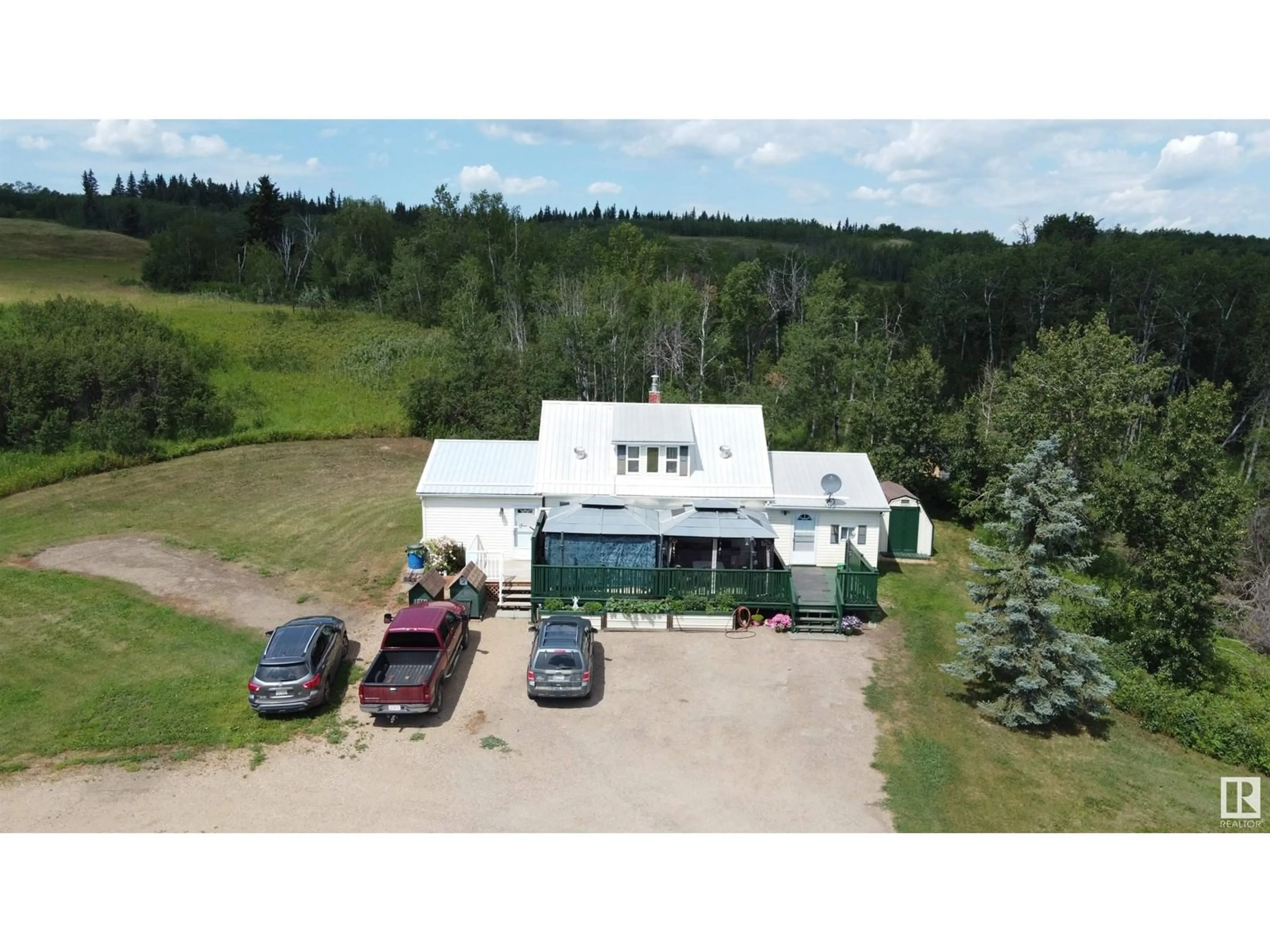 A pic from outside/outdoor area/front of a property/back of a property/a pic from drone, unknown for 7308 TWP RD 562, Rural St. Paul County Alberta T0A1A0
