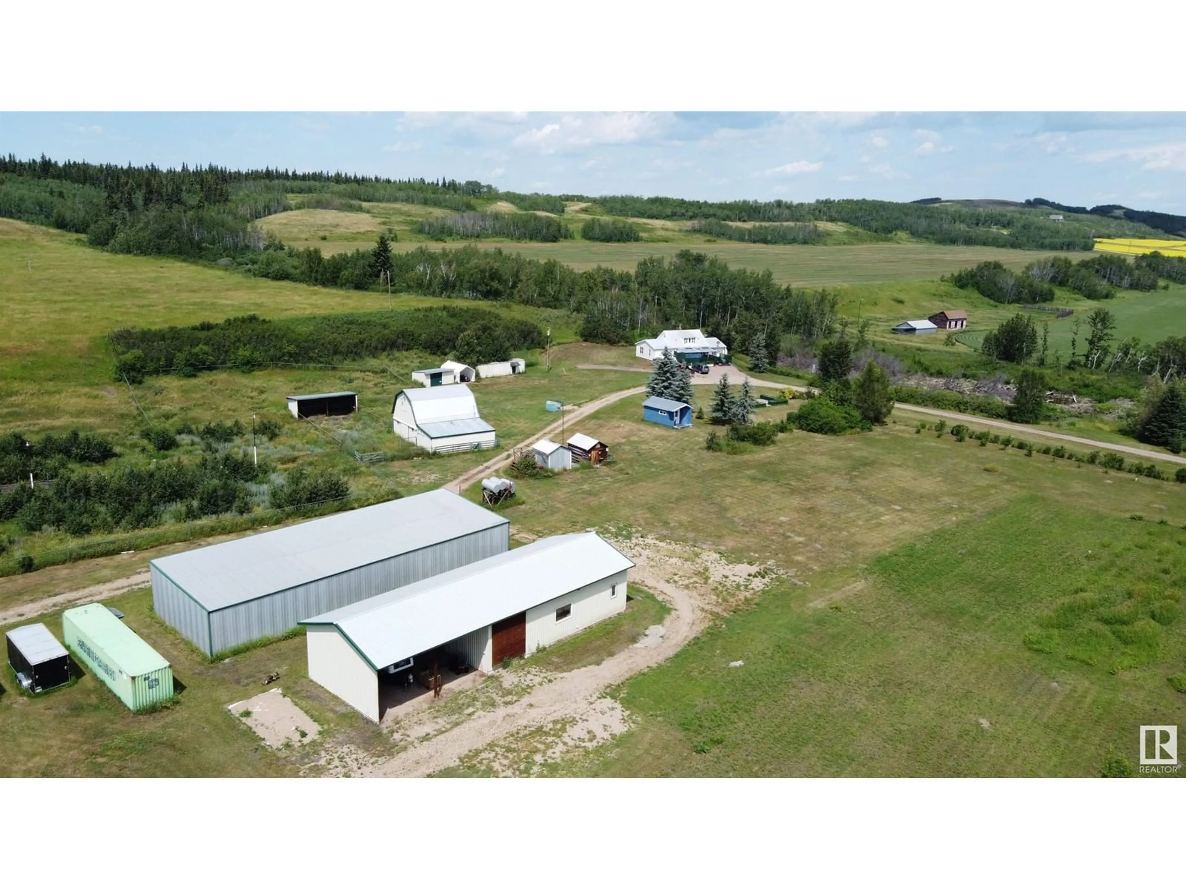 A pic from outside/outdoor area/front of a property/back of a property/a pic from drone, building for 7308 TWP RD 562, Rural St. Paul County Alberta T0A1A0