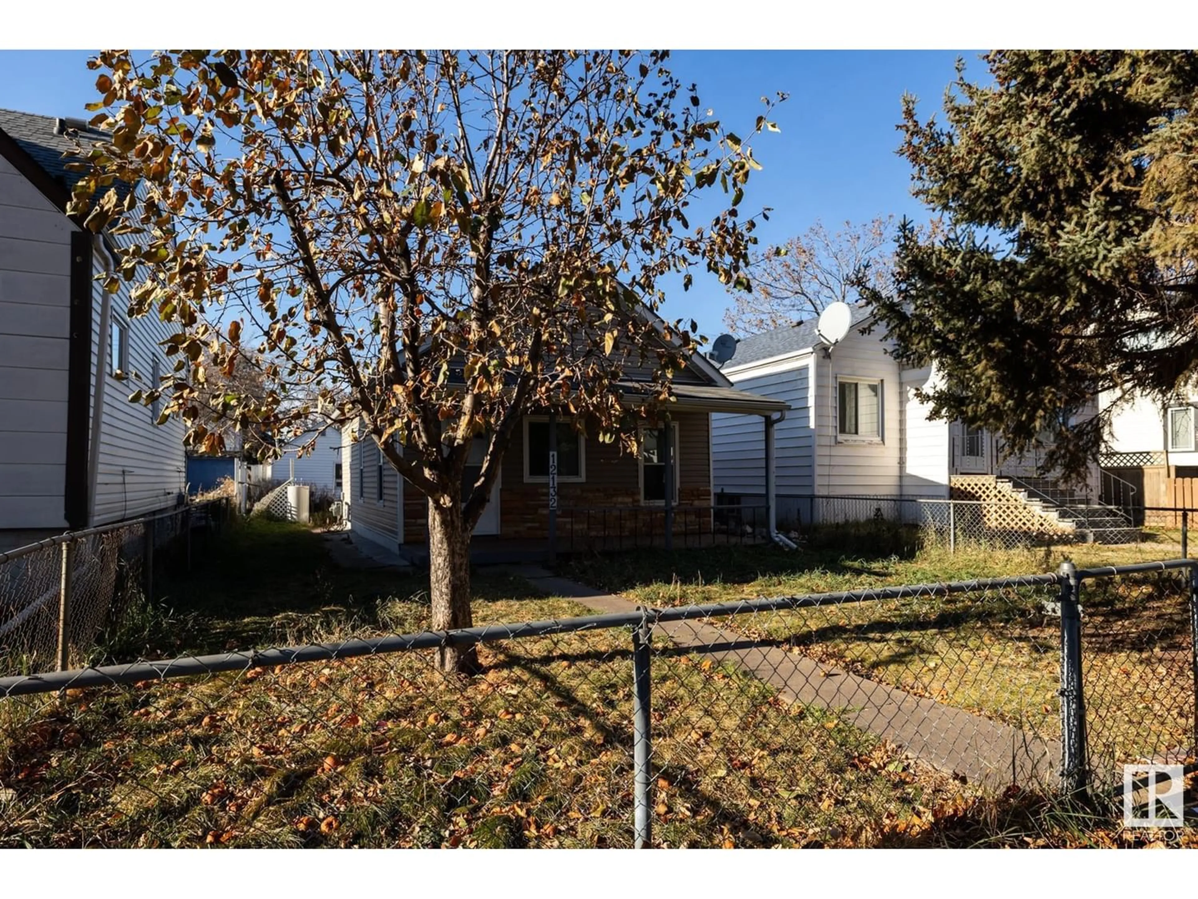 Frontside or backside of a home for 12132 95A ST NW, Edmonton Alberta T5G1R9