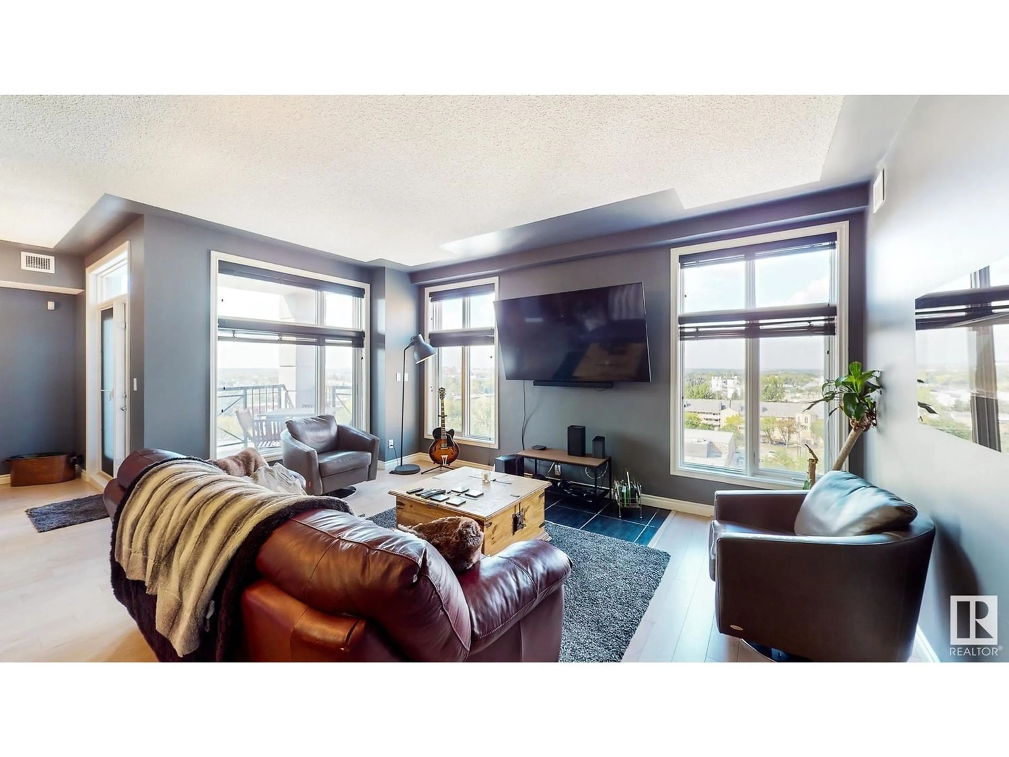 Living room for #1101 9020 JASPER AV NW, Edmonton Alberta T5H3S8